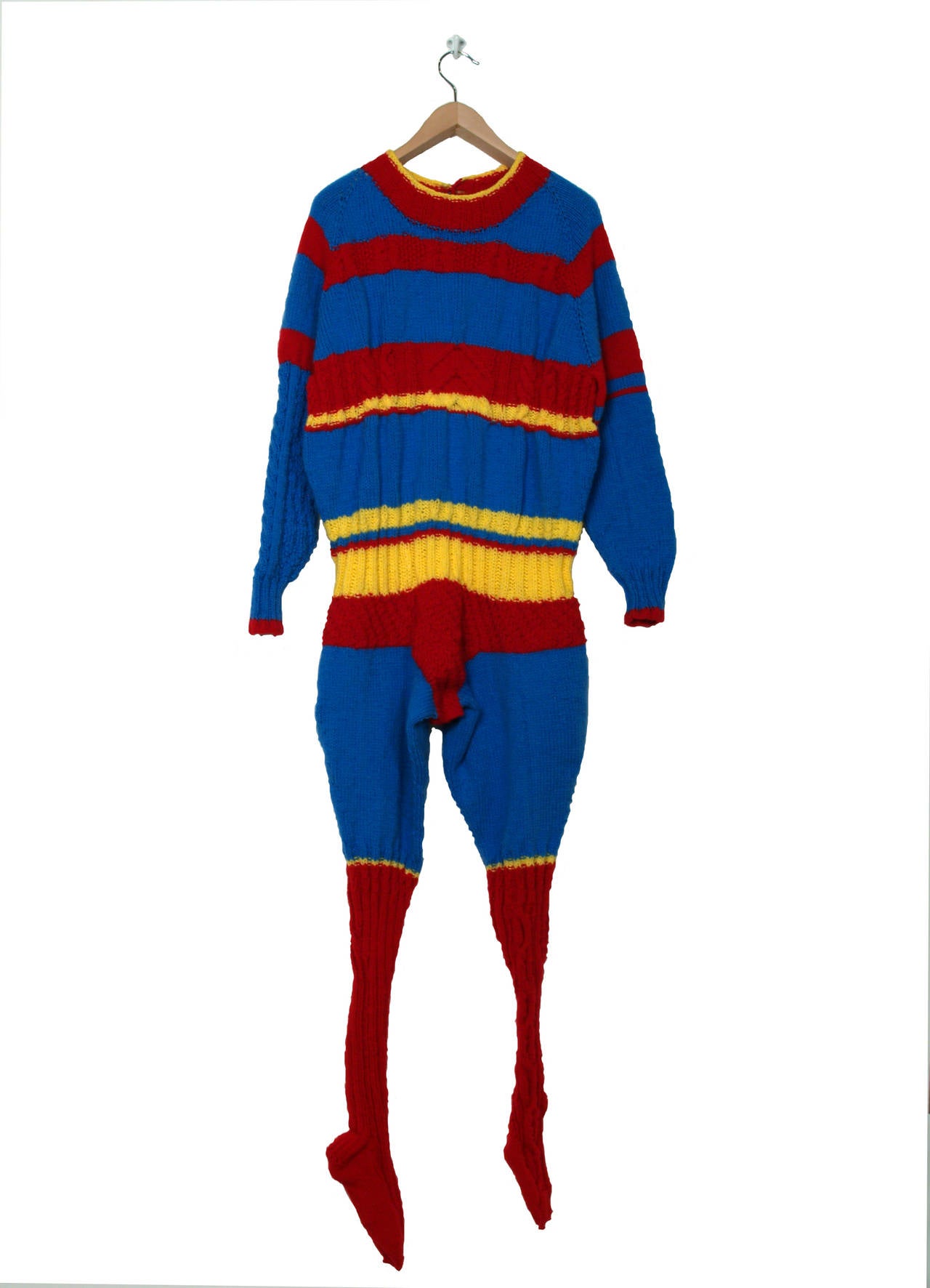 Channeling memories of both his mother and grandmother making sweaters to keep their children safe and warm, he relates the act of knitting as a heroic gesture. Further inspired by the heroes, toys, and action figures of his youth, Newport