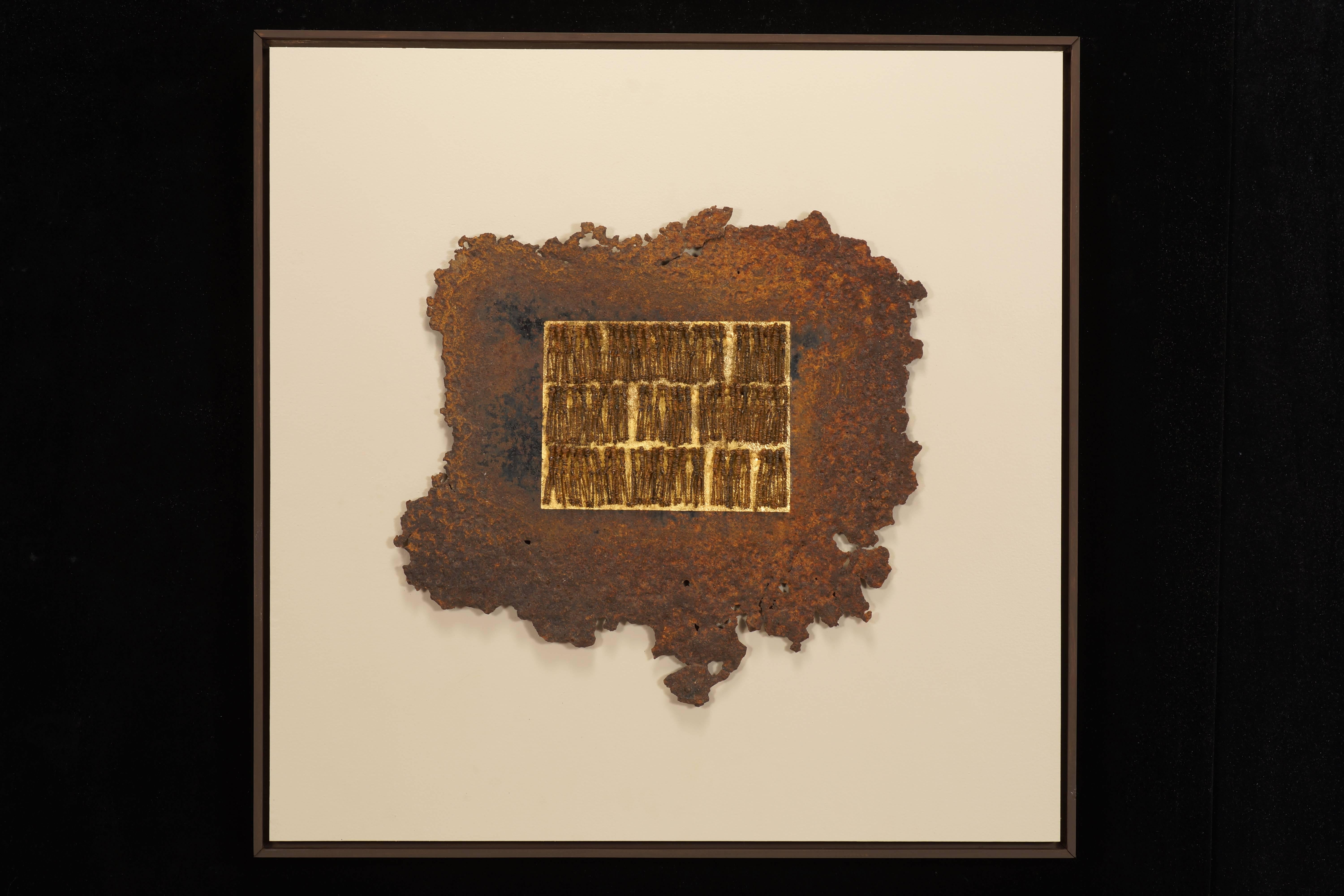 Mary Giles utilizes textile processes and fiber techniques to create refined contemporary sculptural forms that reference nature and geography. 

Golden Tablet is constructed from found metal, rusted iron wire, gold leaf, all mounted on a wood