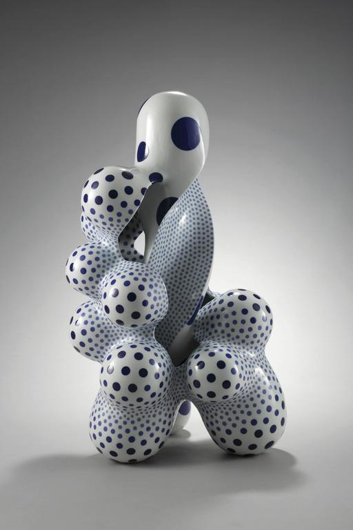 Harumi's work combines incredible complexity with a elegant and refined form. The dot patterning placed on the surface, one by one, accentuates and compliments the form, making for breathtaking porcelain sculpture.
31" x 16.5" x 16"