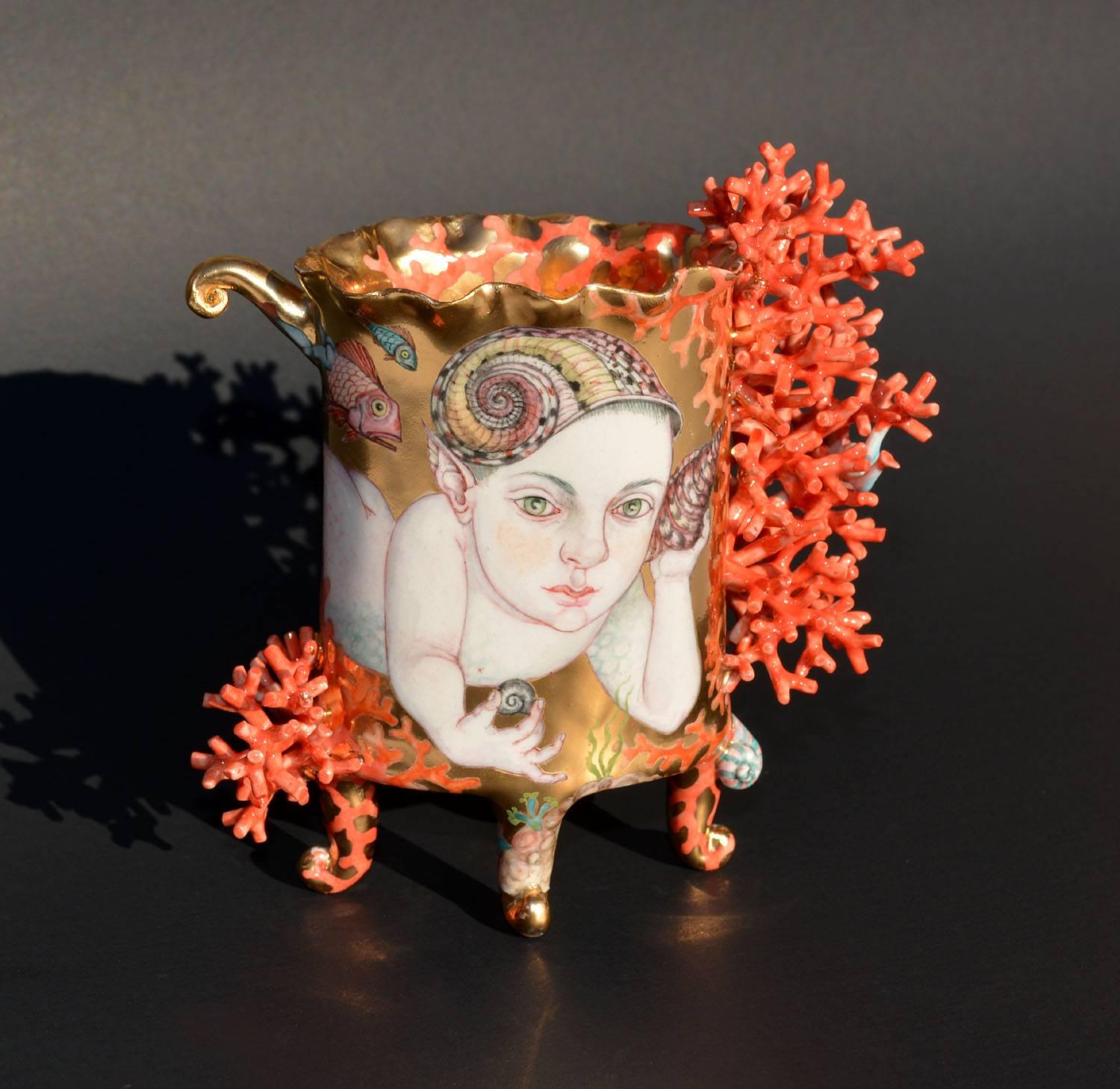This remarkable piece by Irina Zaytceva features a beautiful gold luster glaze and hand painted illustration.  Irina's work is known for its incredible level of detail in both 2D and sculptural accents. 

Contact us today to learn more about this