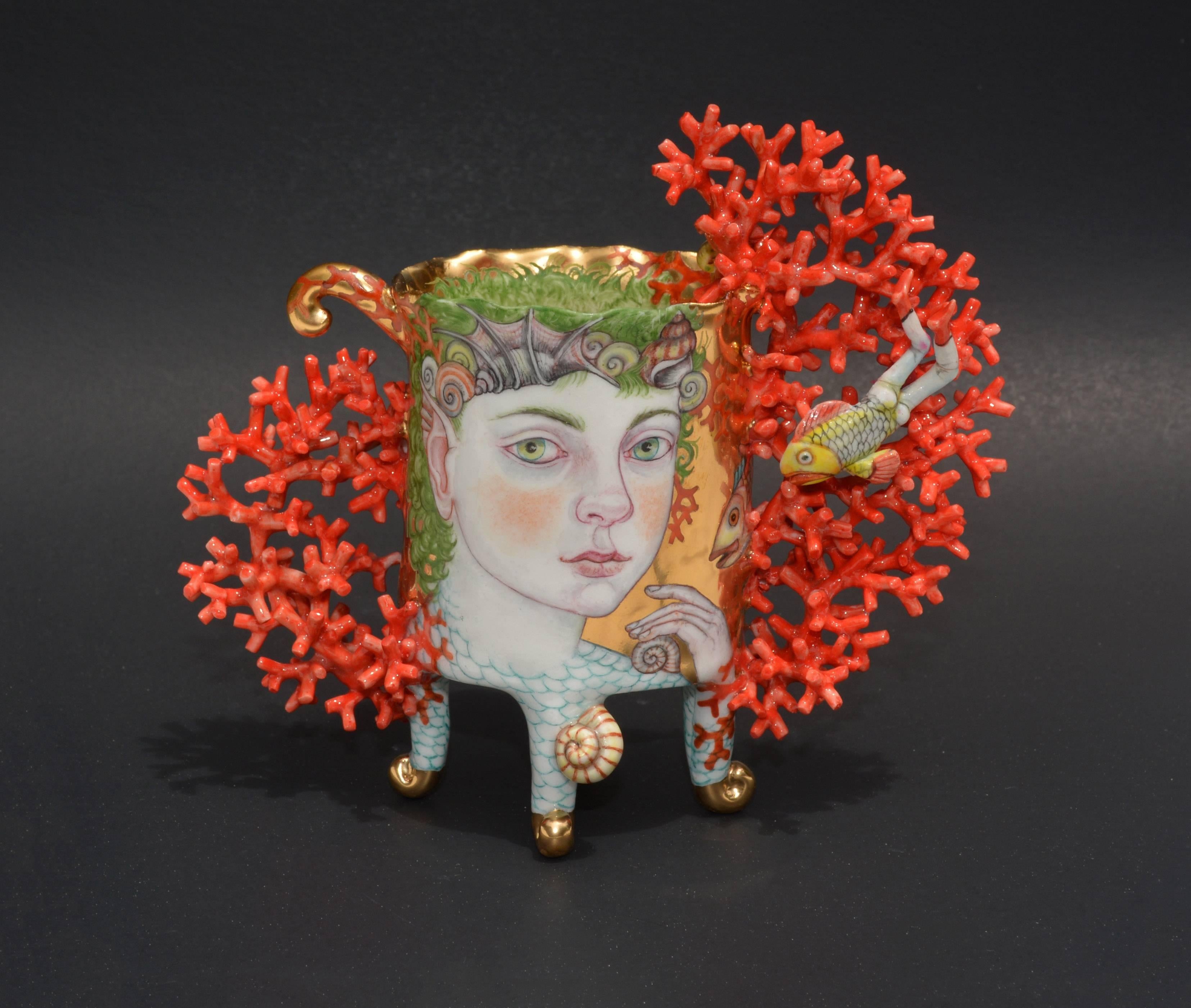Delicately hand sculpted porcelain body with lovingly applied painted illustration over gold luster glaze. 

Irina Zaytceva was born in Moscow, Russia in 1957. As a child, she loved to draw and sculpt and eventually decided to make it her vocation.
