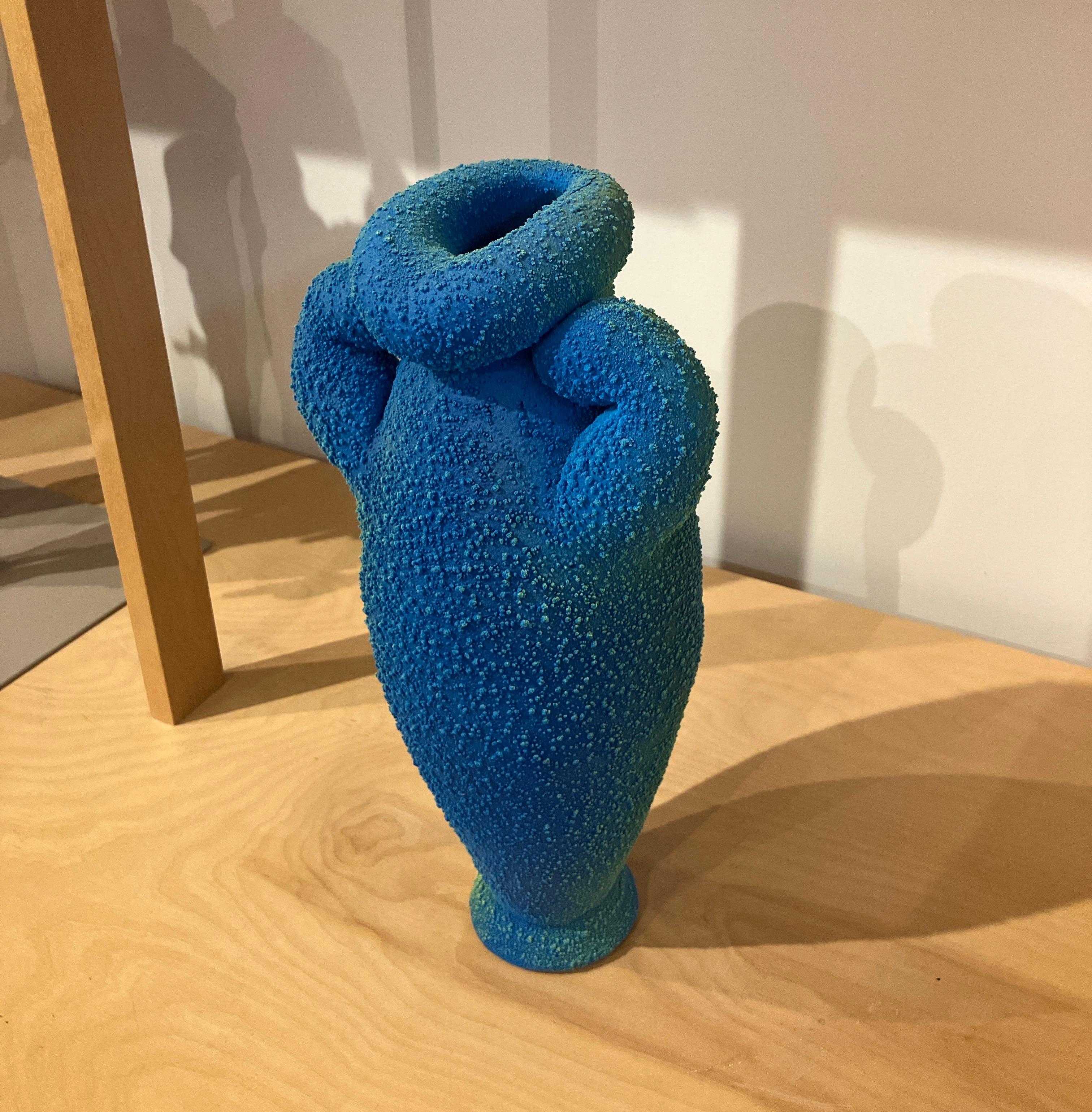 Contemporary Ceramic Sculpture, Mixed Media, Stoneware, Pigmented PVC Surface

Maxwell Mustardo is a ceramic artist whose highly textured forms are the result of meticulous research into the chemistry of kiln firing. He includes materials such as