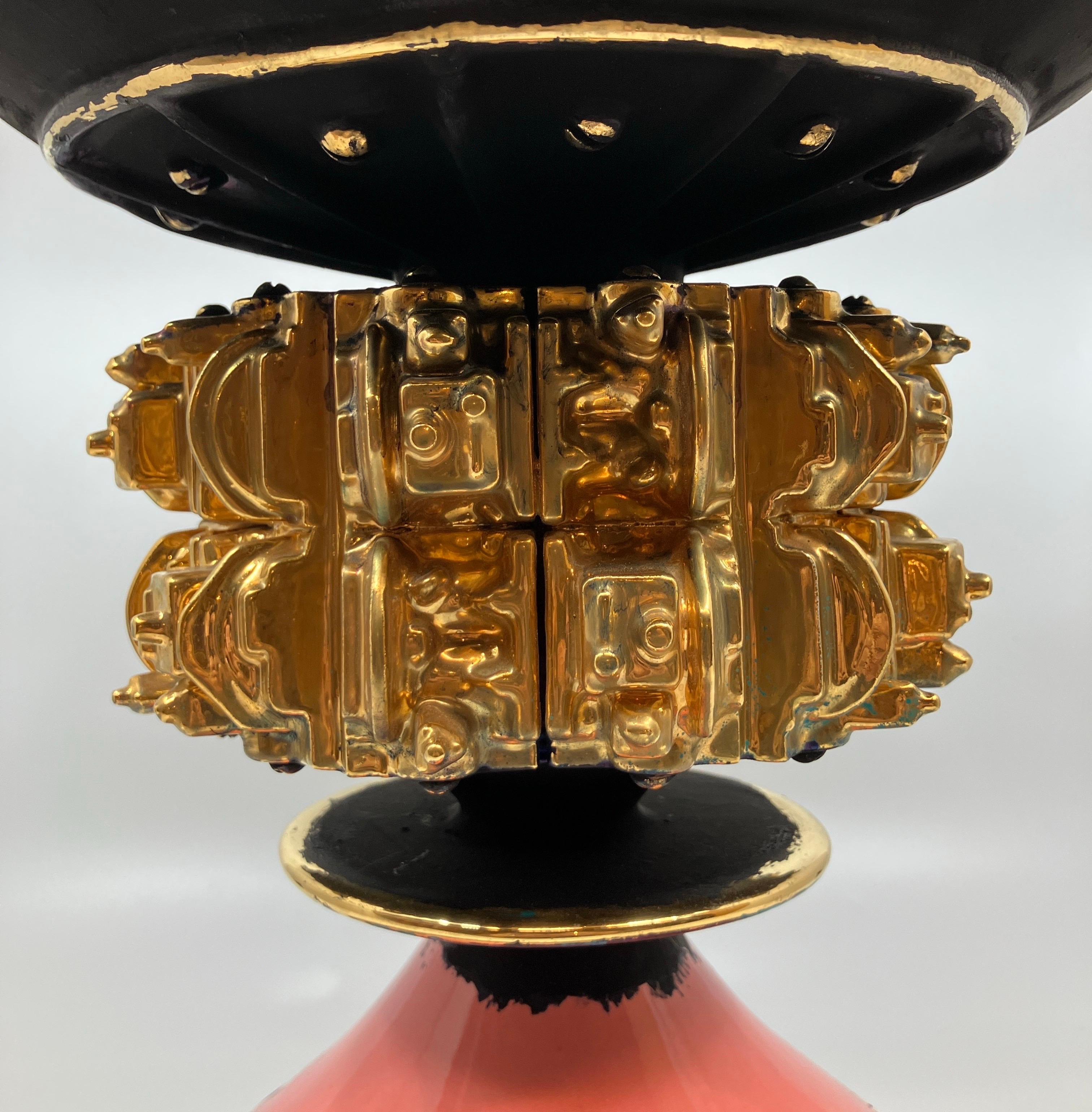 Born in Detroit, Steven Montgomery’s work revels in a history of industry and aging as the artist uses porcelain to produce intricate mechanical forms with the appearance of metal. His recent Euclidean Series introduces gold luster and an illusion