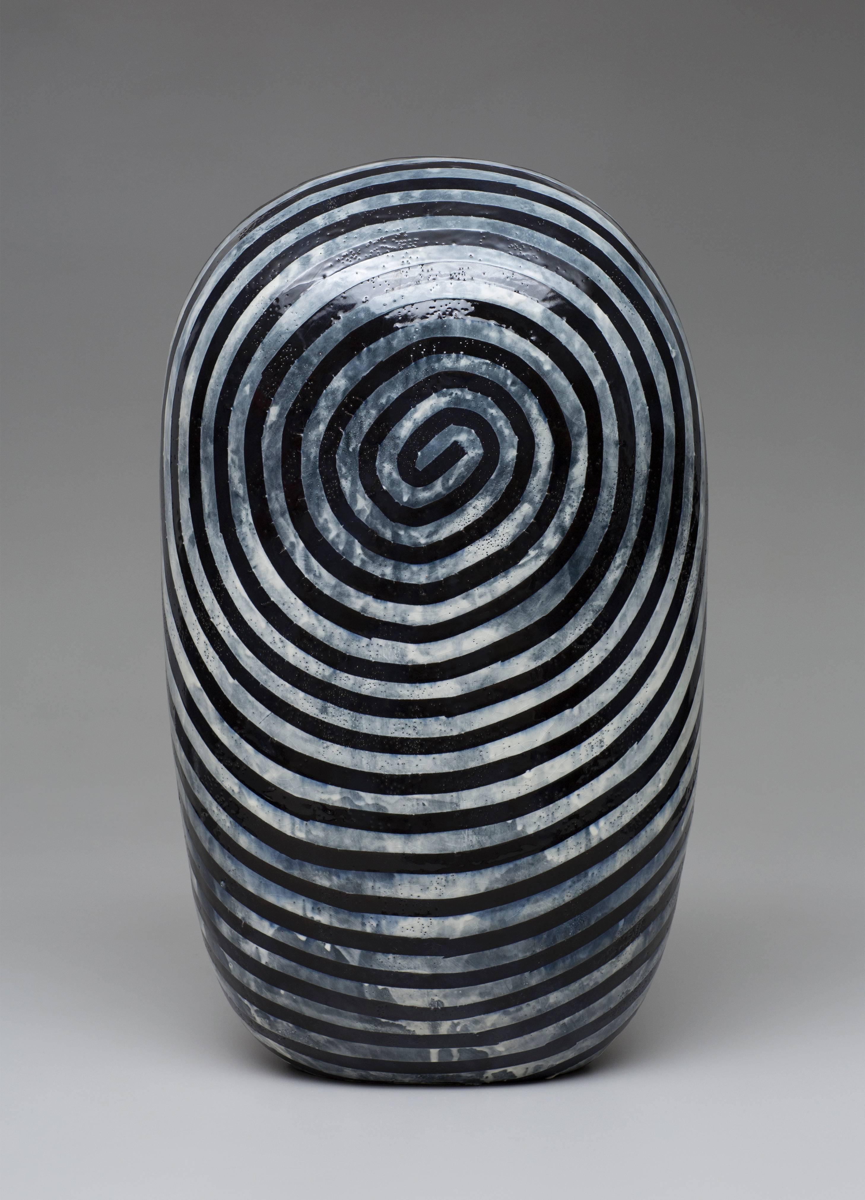 This wonderful piece by Jun Kaneko stands at 24.5" high.  Being on the smaller side of his Dango forms is advantageous for the collector wishing to acquire a piece of Kaneko's without needing a monumental space to display the work.  The patterning