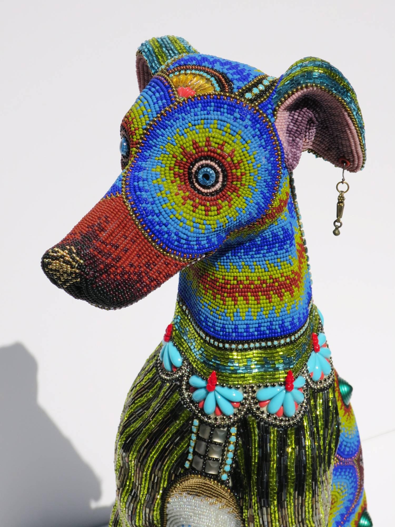Jan Huling's craft combines obsessively applied beads with fun and whimsical forms, giving each piece a unique personality; with his playful expression and cheerful demeanor, Dicky Boy is no exception. 

Created 2016
20.5