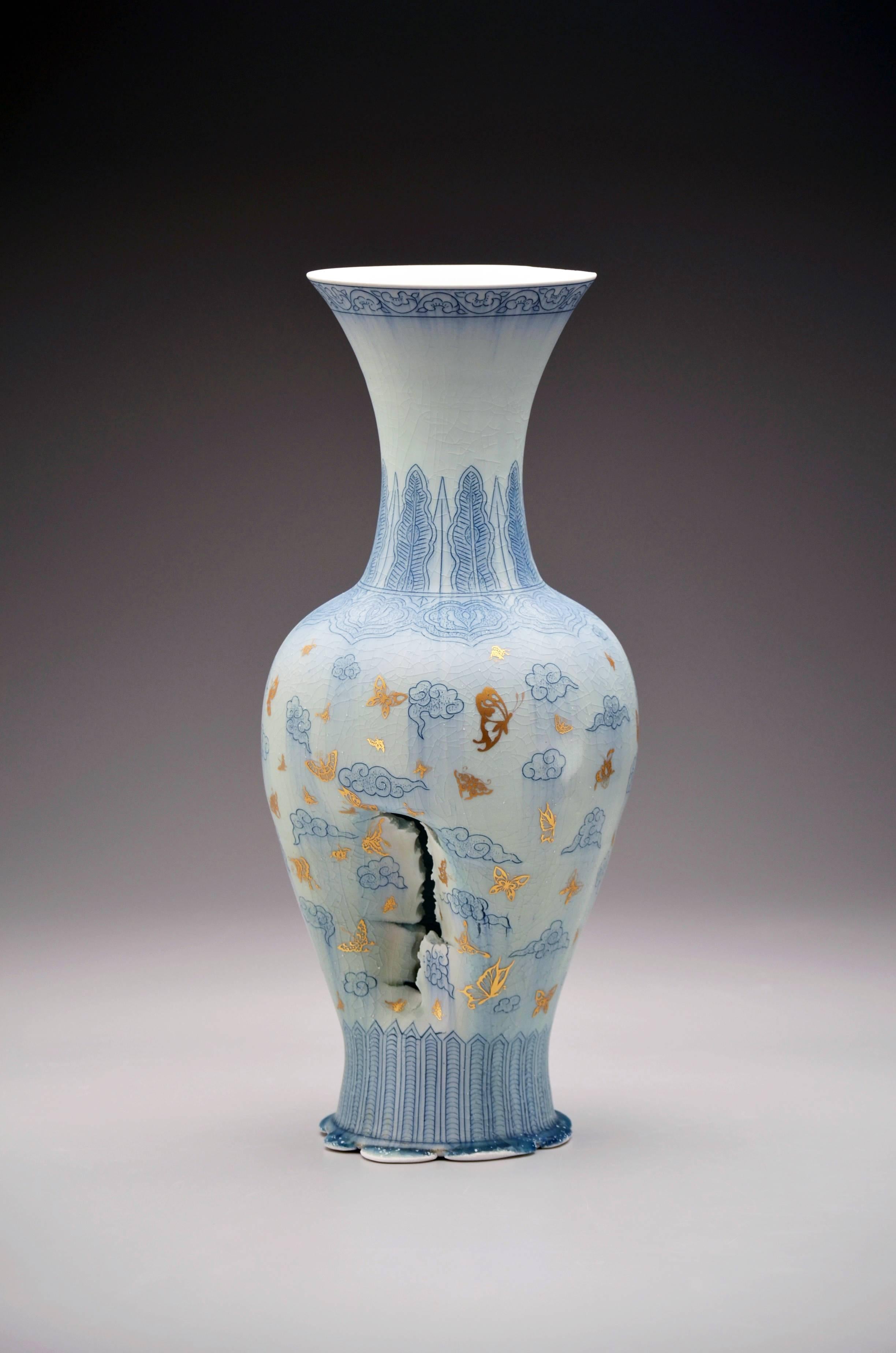 Vase with Clouds and Butterflies is another fantastic example of the marvelous work that Steven Young Lee produces.  Crafting traditional vessel forms flawlessly, Steven then deconstructs the piece, giving it a dramatic sculptural edge. 

22&quot;