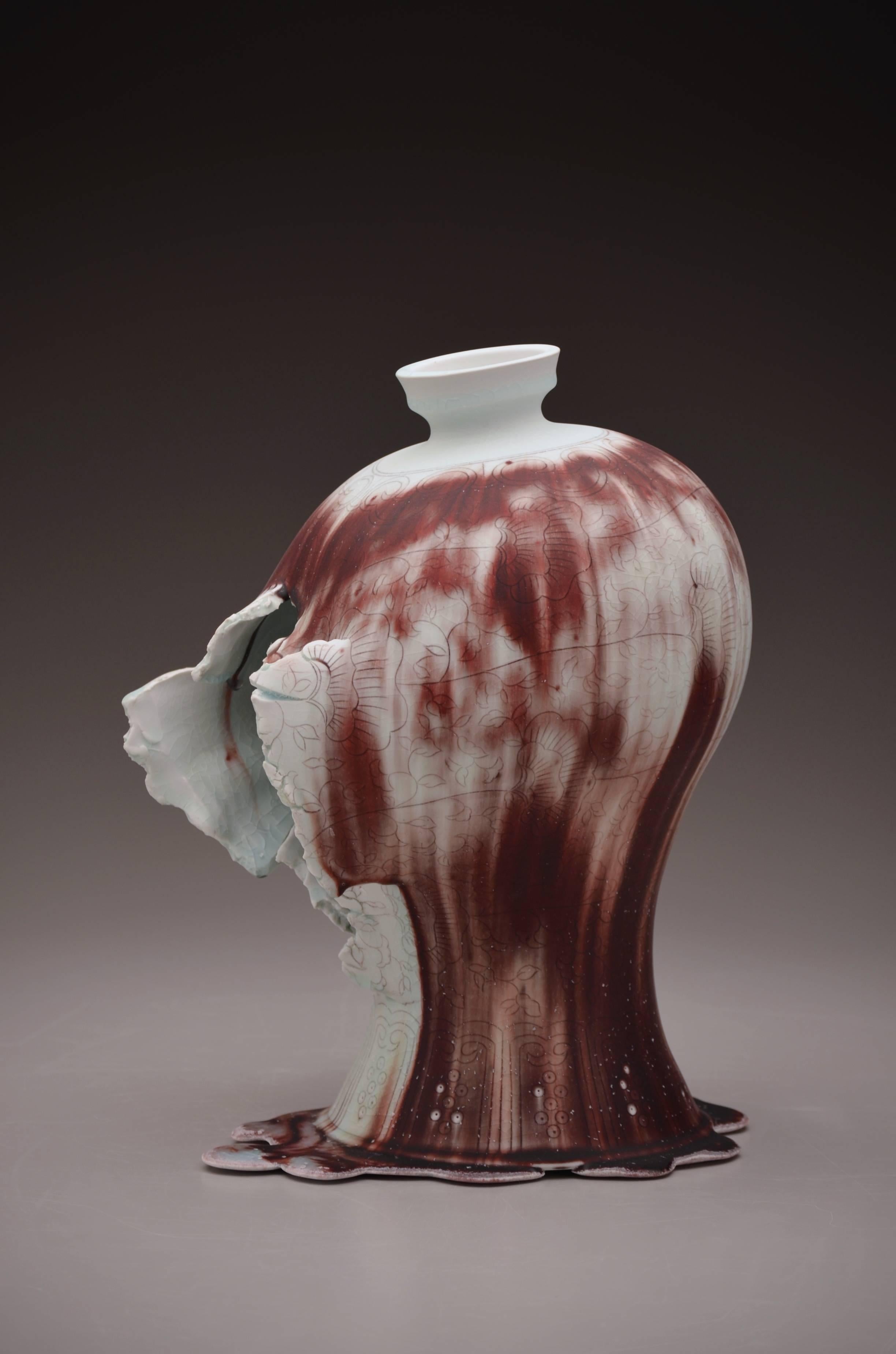 Dimensions: 15&quot; x 12&quot; x 19&quot;
Materials: Porcelain, Copper Inlay, Glaze

References to ancient Asian porcelain vase forms with occasional contemporary references abound in the drawing and form of Lee's work. Allowing the form,