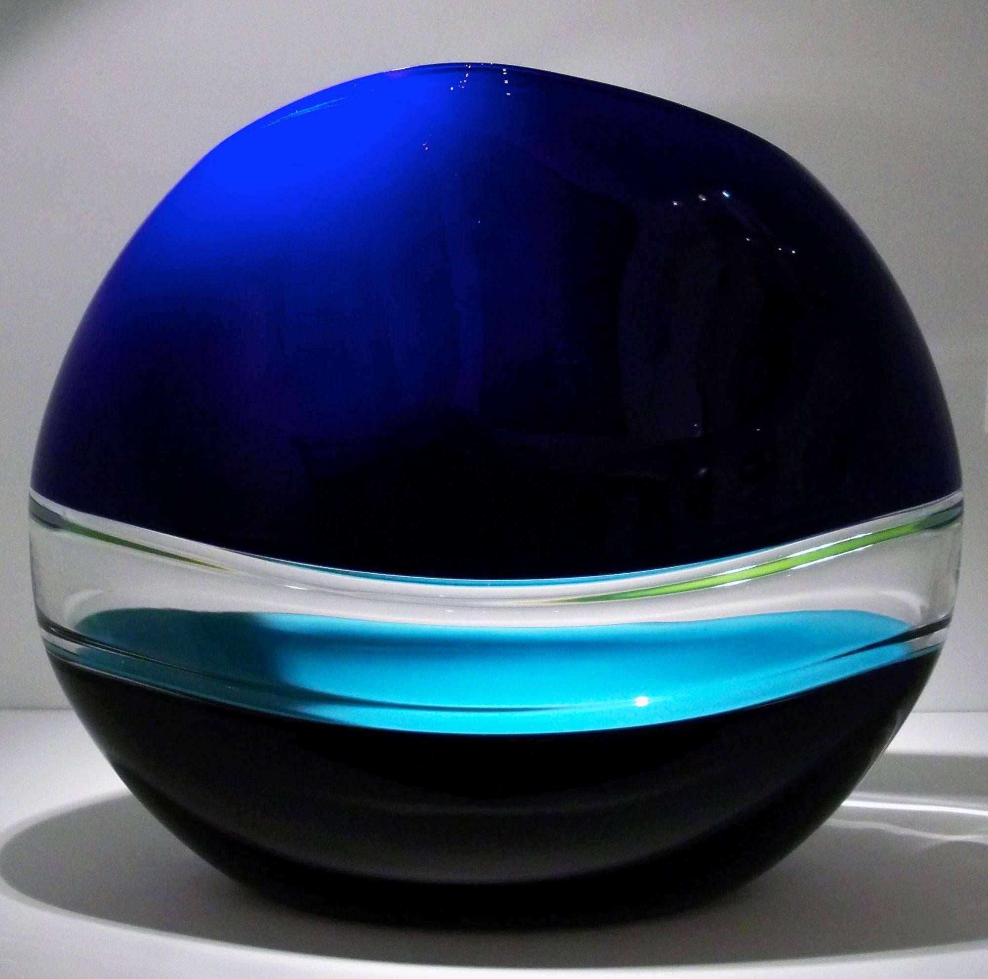 Jamie Harris straddles the disciplines of painting and glass blowing approaching his work, “more from a painterly perspective than as a traditional glassblower.” His work is primarily about something simple: ”loud splashes of color, capturing the