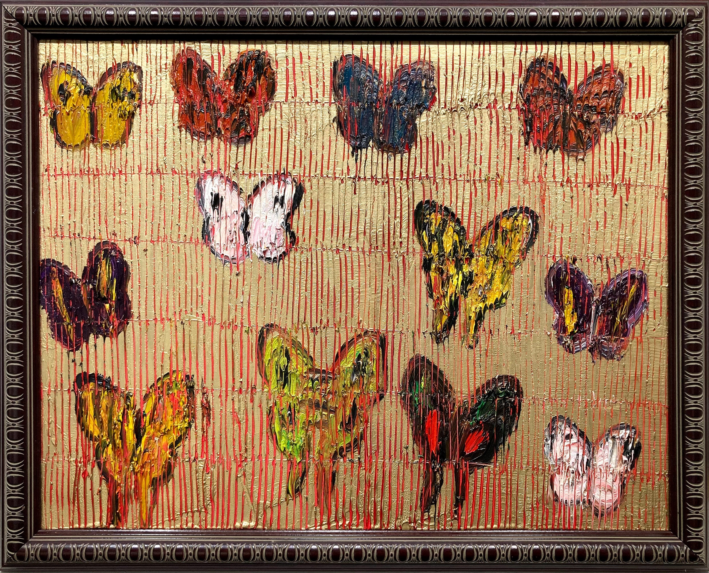 « Côté mer Rouge » : papillons multicolores sur fond or brillant, avec cadre antique