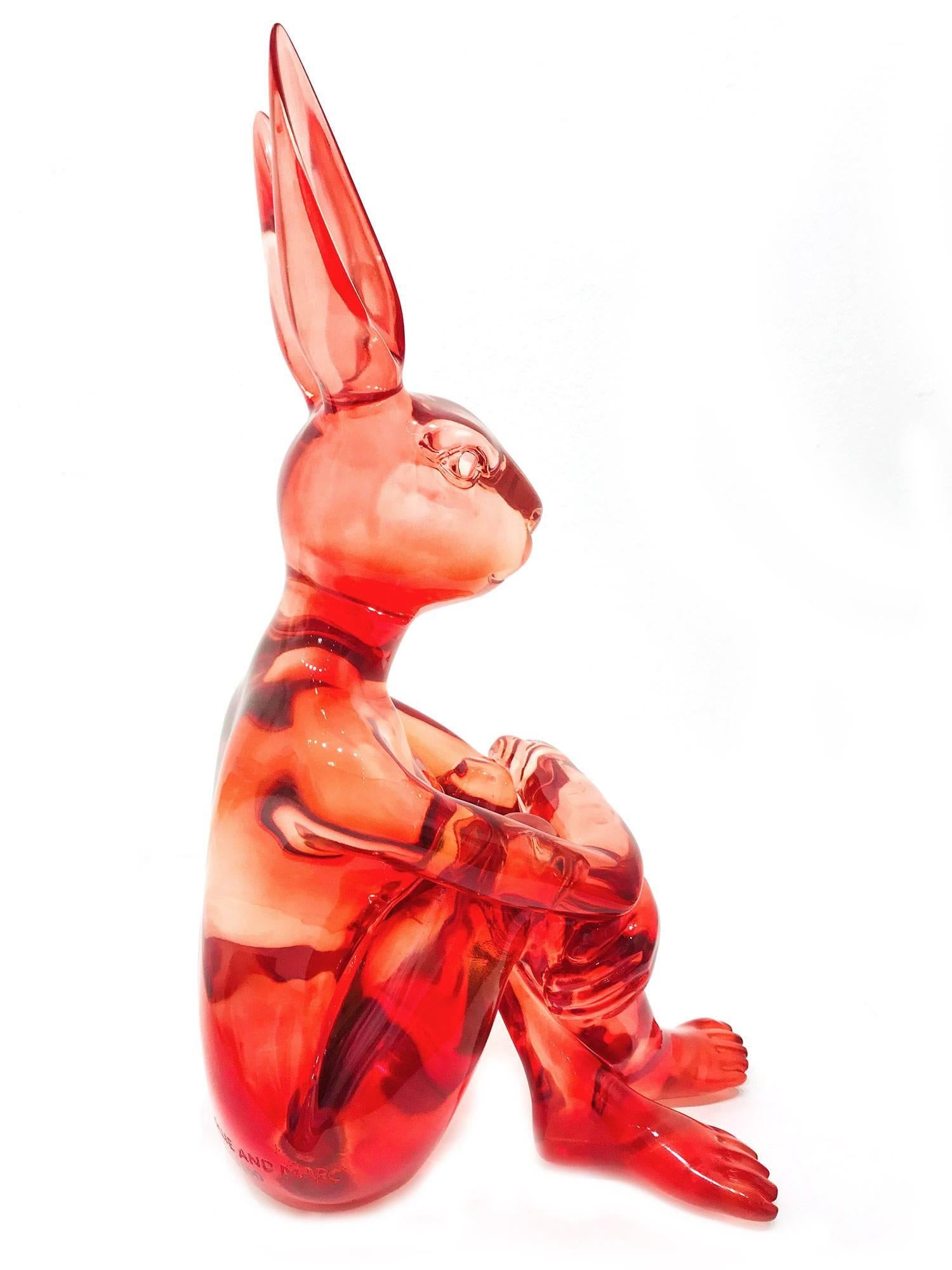 A whimsical yet very strong piece depicting the Rabbit Girl from Gillie and Marc's iconic figures of the Dog/Bunny Human Hybrid, which has picked up much esteem across the globe. Here we find Rabbit Girl sitting crossed legged in a bright and fun