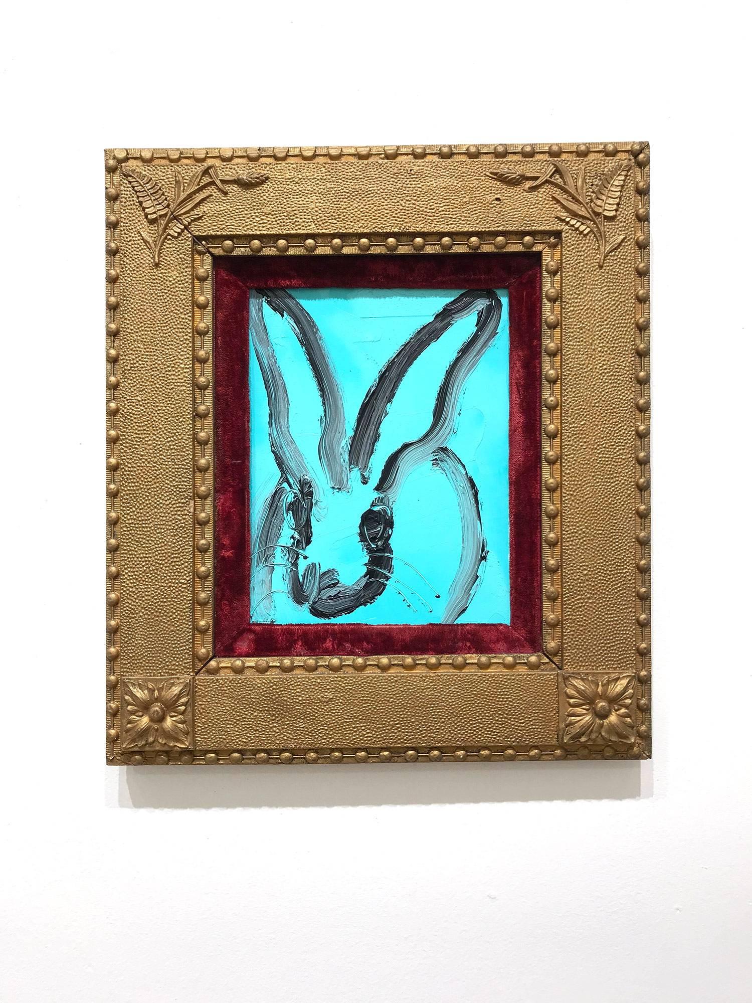 A wonderful composition of one of Slonem's most iconic subjects, Bunnies. This piece depicts a gestural figure of a black bunny on white background with thick use of paint. It is housed in a wonderful antique 19th Century frame. Inspired by nature