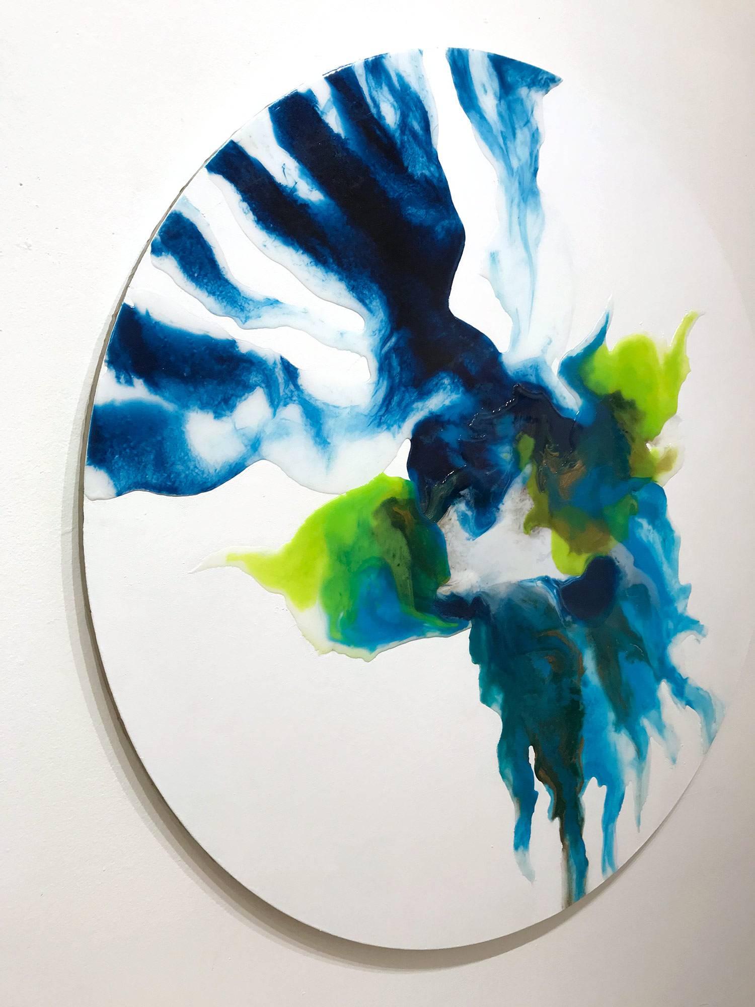 A dramatic circular mixed media on canvas painting with wonderful details and pops of cobalt blue and lime green. We are enamored by the stark contrast, as the shape of the paint takes on unique and stunning forms. A wonderfully colorful and strong