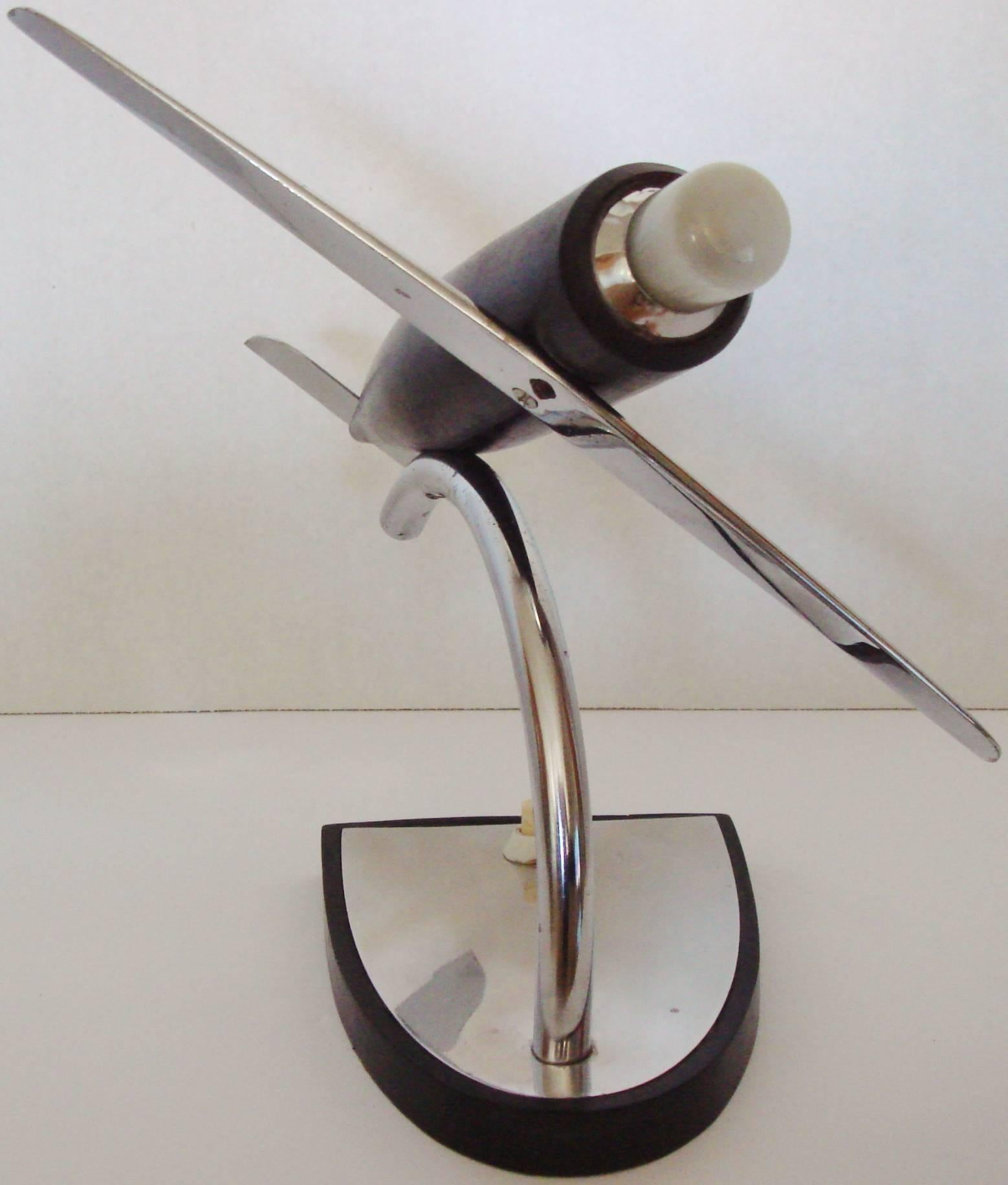 Plated German Art Deco Chrome, Ebonized Wood and Bakelite Stylized Airplane Accent Lamp For Sale