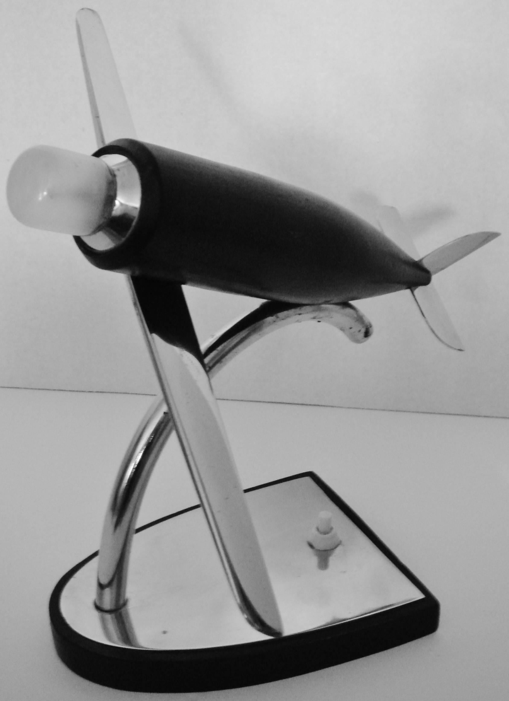 Mid-20th Century German Art Deco Chrome, Ebonized Wood and Bakelite Stylized Airplane Accent Lamp For Sale