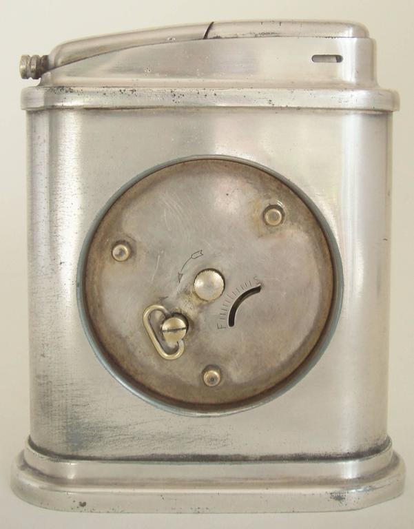 American Streamline Modern Automatic Clock and Table Lighter by PhinneyWalker For Sale at 1stdibs
