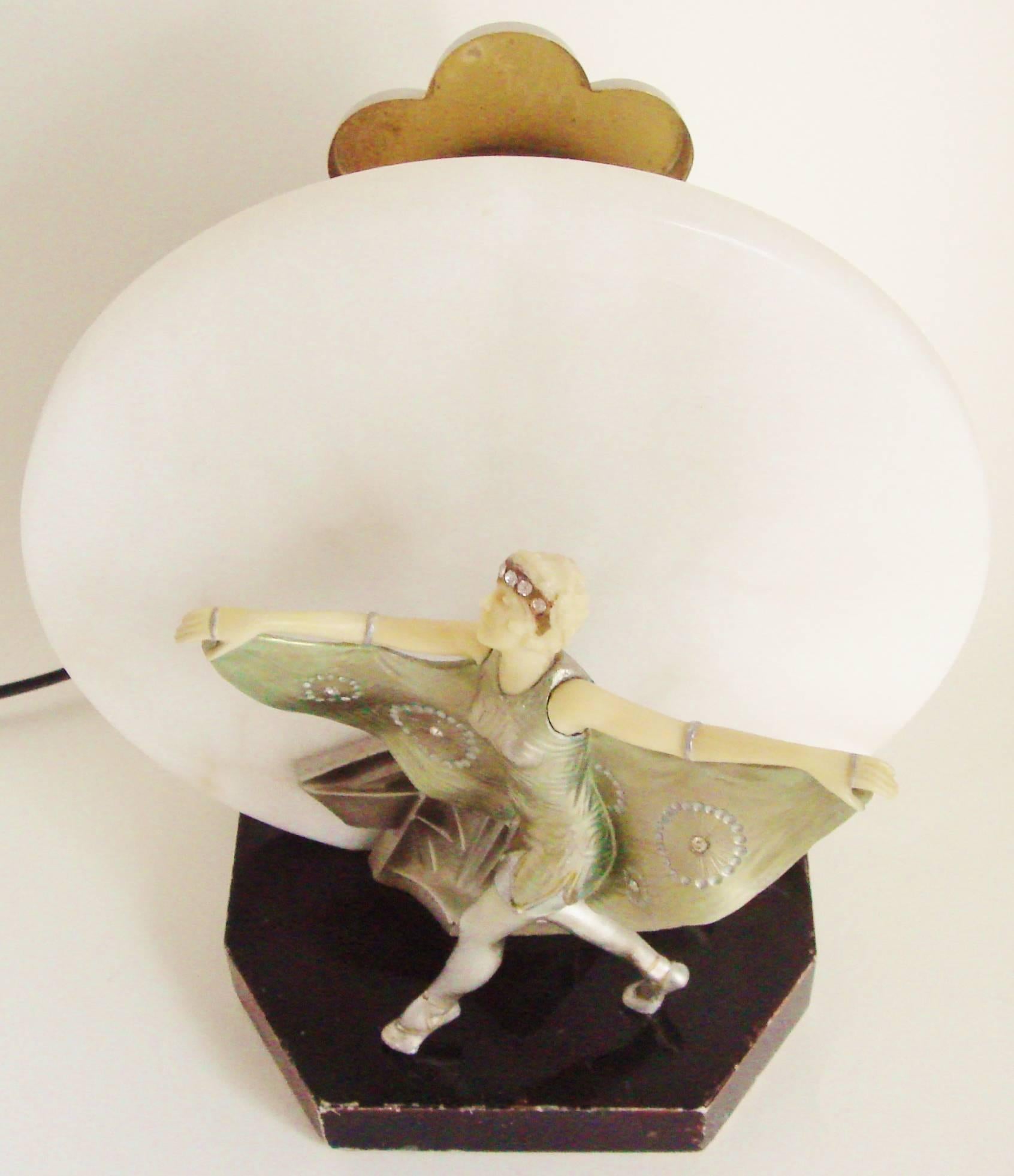 This beautiful and rare French Art Deco figural accent lamp is from a design by Gerda Iro Gottstein (Gerdago), the prolific German costume designer and sculptor (1906-2002). The subject matter is the German dancer, Niddy Impekevon, in her costume