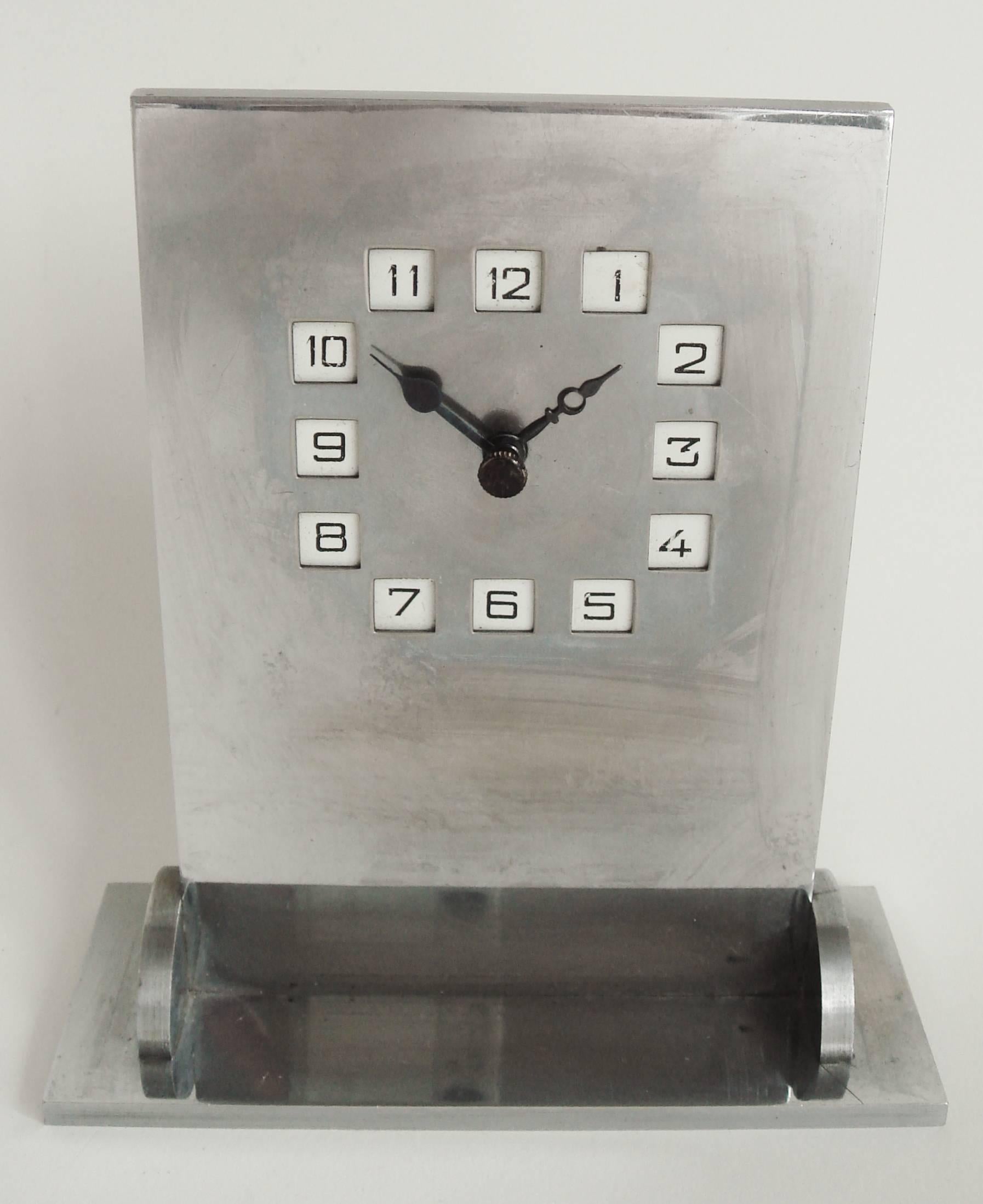 This rare Art Deco desk clock has distinct style echoes of the prewar Secessionist Movement and yet it is marked 