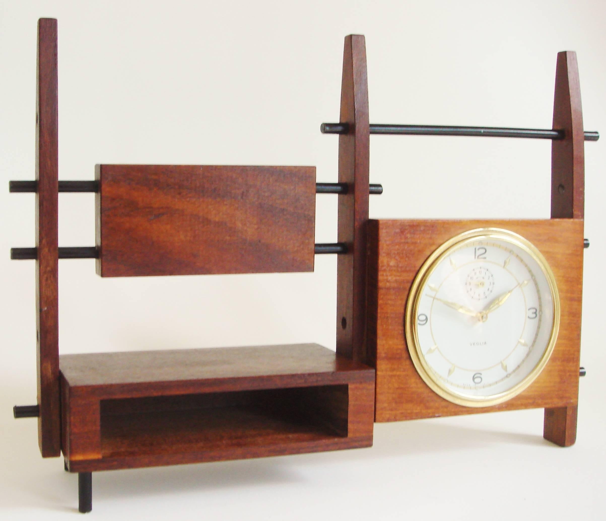 Carved Italian Mid-Century Teak, Rosewood and Black Metal Veglia Mechanical Alarm Clock For Sale