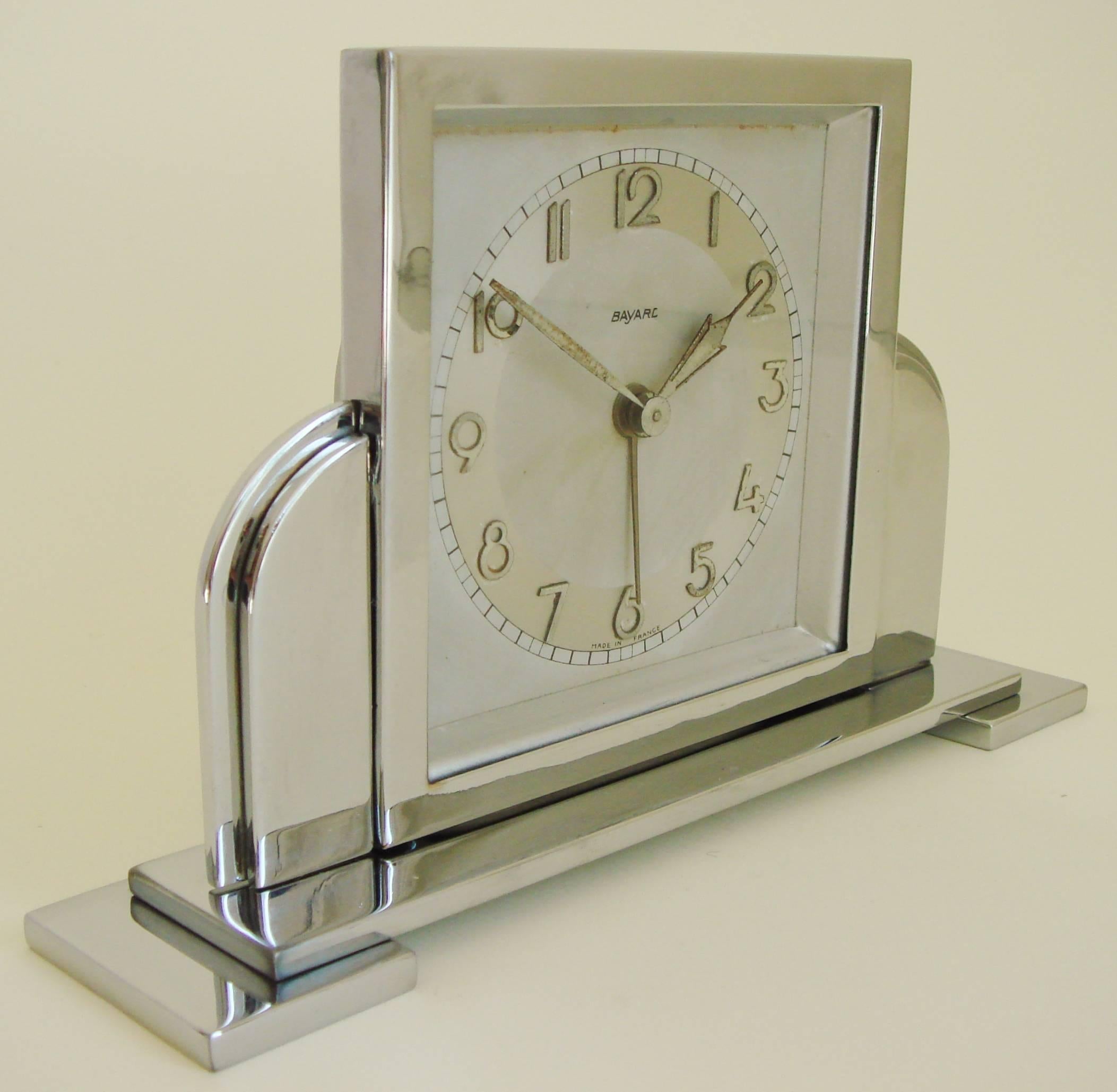 This delightful chrome-plated mid-sized mechanical alarm clock is by the renowned French clock-making firm of Bayard. The Art Deco face, crystal and all of the chrome is in wonderful condition with only the very stylish hands and numerals showing