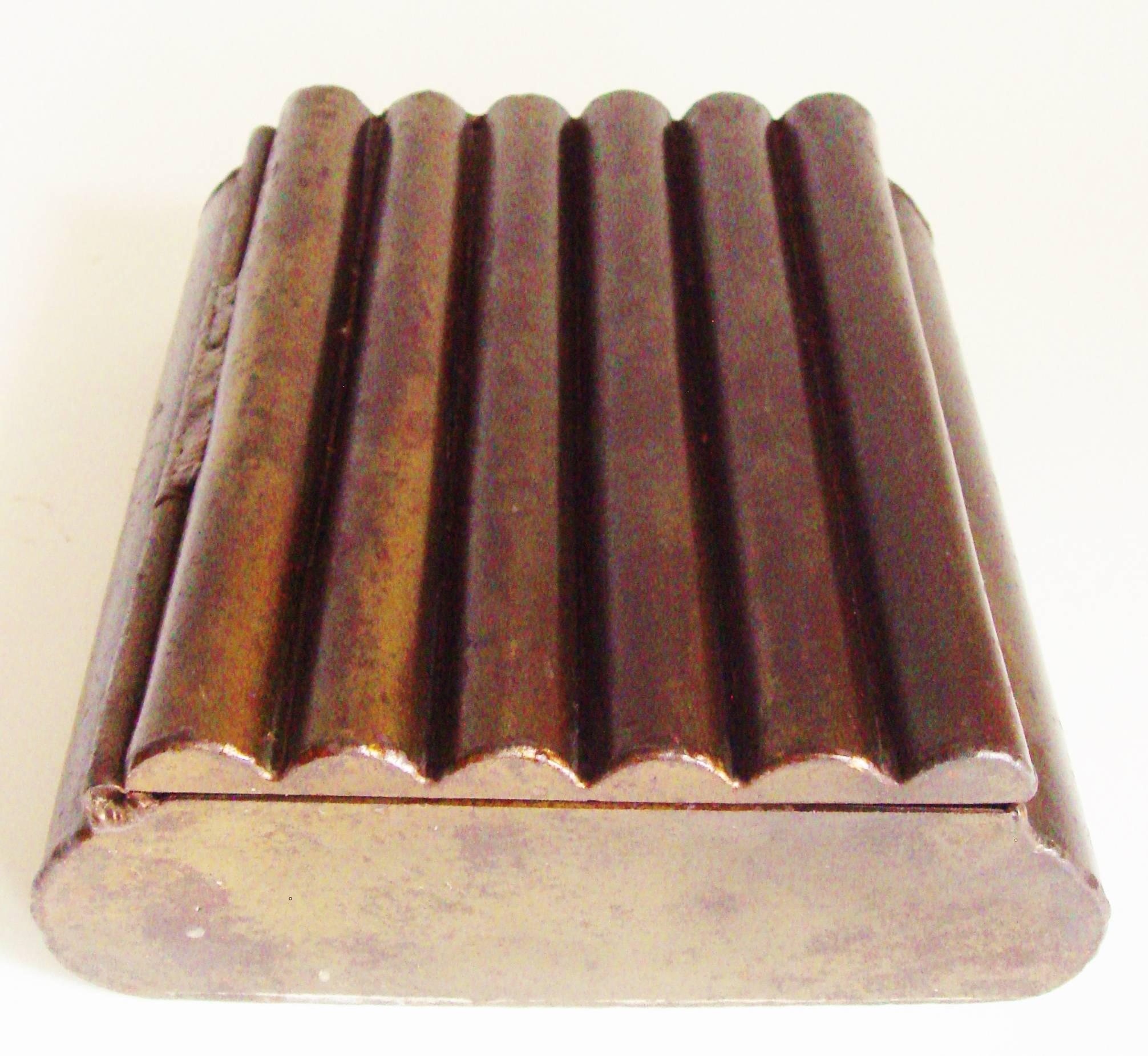 This Canadian Art Deco cigarette or trinket box would appear to have been made by someone working on the line at the Curtiss-Reid Aircraft Company, Montreal one year after their establishment in 1928. (The year when the Curtiss Aeroplane and Motor