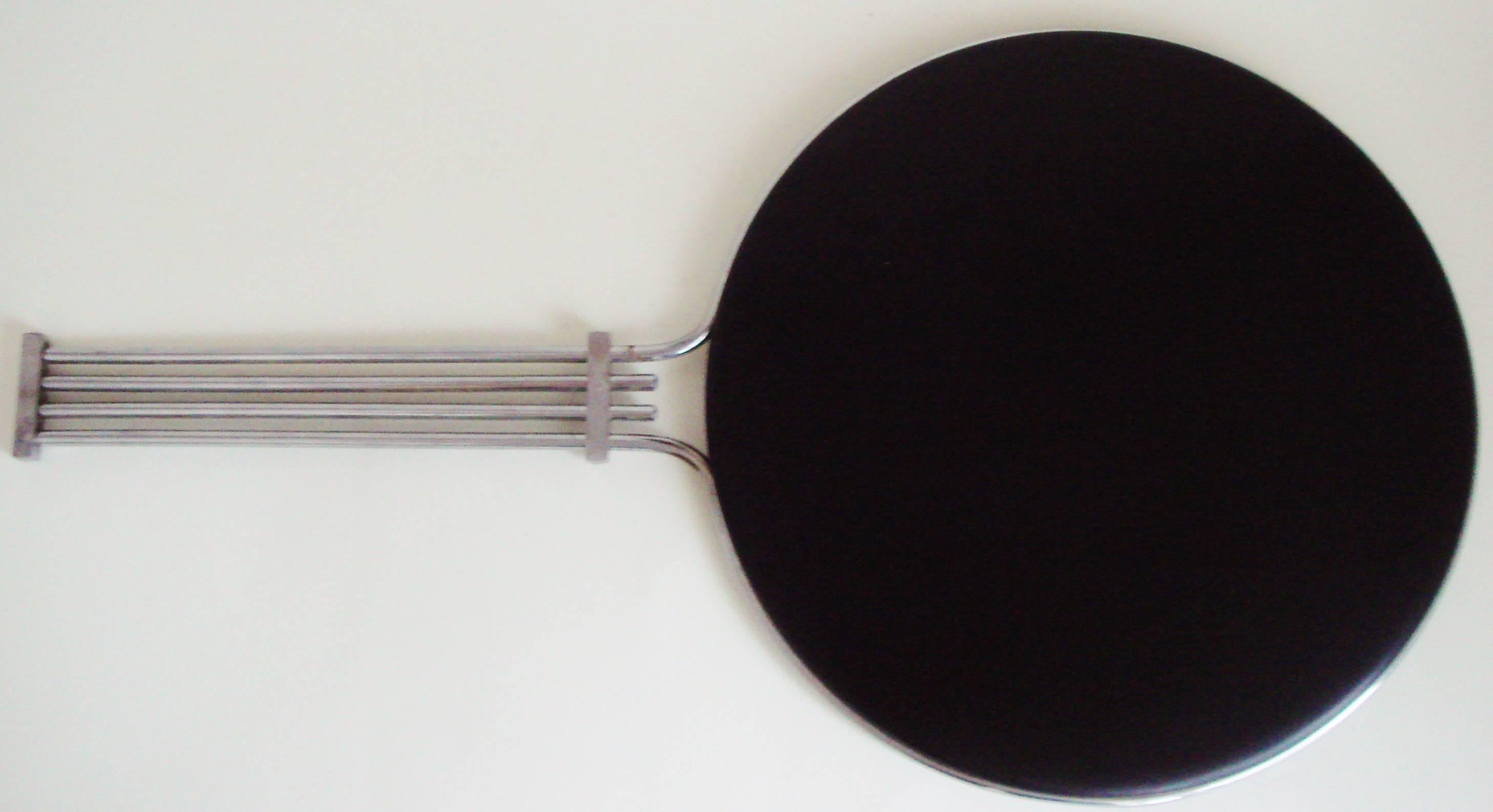 This magnificent, large American Art Deco chrome and black lacquered wood hand mirror is from a department store haberdashery department. These mirrors were used in order that Madame could 