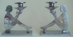 Pair of English Art Deco Chrome Figurative Seated Female Candlesticks