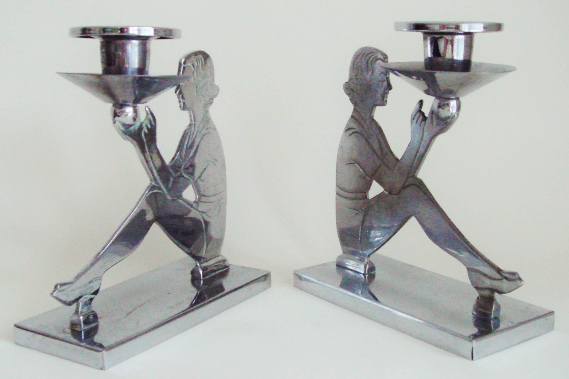 Mid-20th Century Pair of English Art Deco Chrome Figurative Seated Female Candlesticks For Sale