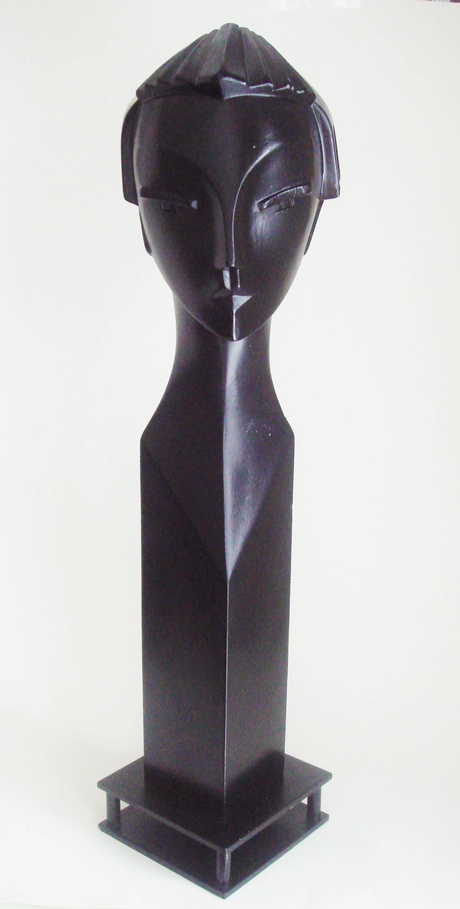 This stunning and elegant English Art Deco Revival long necked mannequin head is by Lindsey Balkweill. She was a former sculpture student of London's famed St Martin's School of Art who in 1983 founded the Lindsey B Company in Fulham, London. For