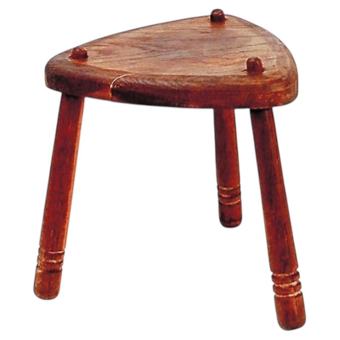 Rustic tripod stool with a triangular seat , 1960s For Sale