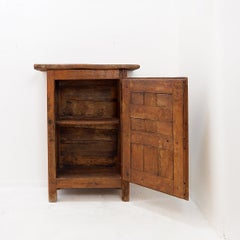Rustic wooden cabinet with carved panel door & iron hardware - Spain, early 19th