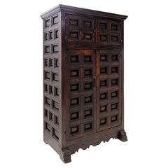 Dark wood Spanish Brutalist-style cabinet from the 1950s