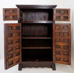 Dark wood Spanish Brutalist-style cabinet from the 1950s