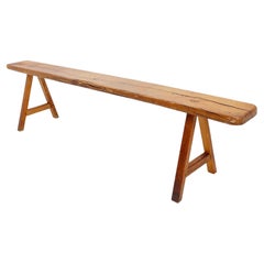 Rustic solid wood farmhouse bench with trestle legs - 1960s