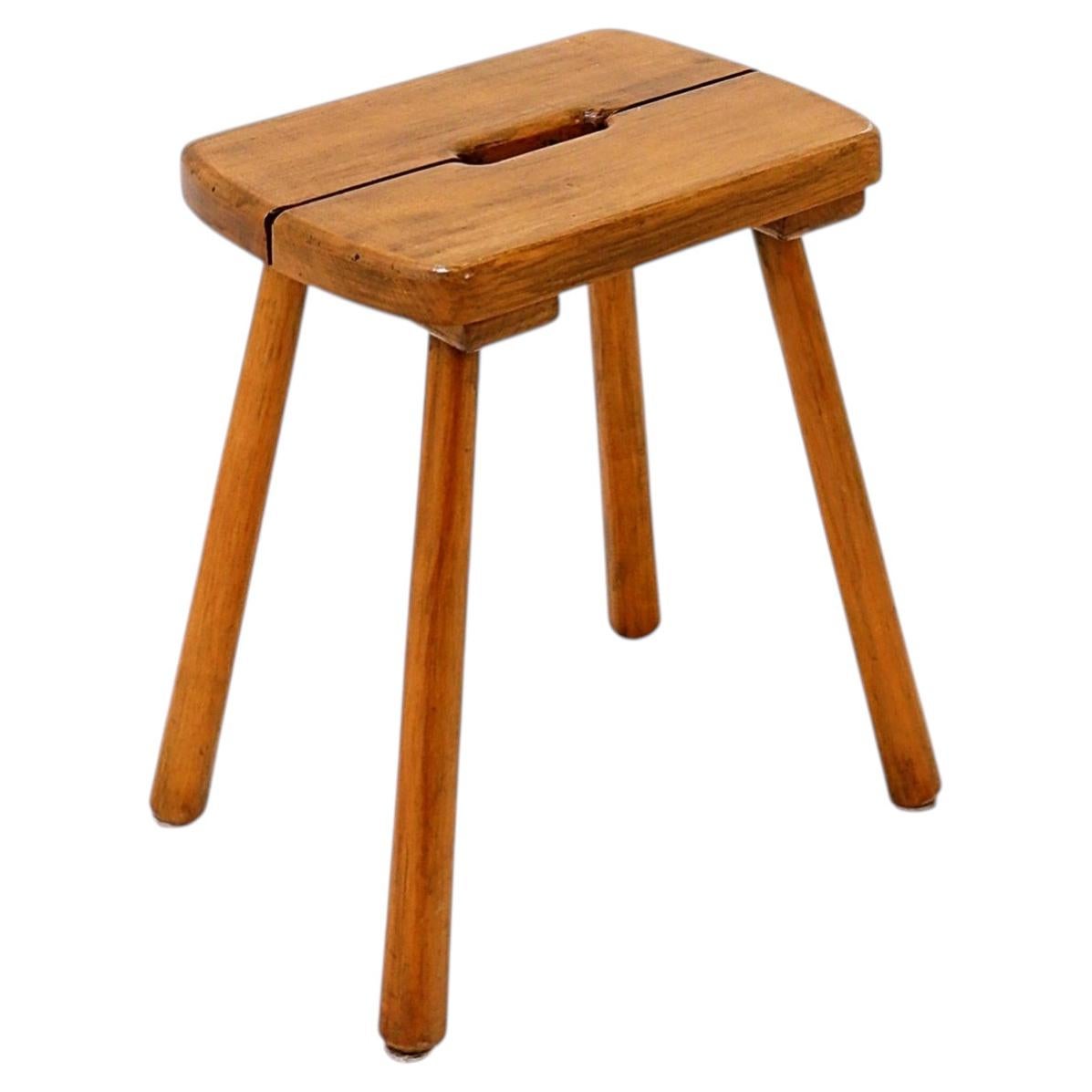 Rustic solid pine stool from the 1960s with four legs