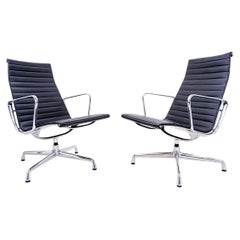 Pair of Vitra EA 116 lounge chairs by Charles & Ray Eames