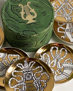 Sottobicchieri dorati “Musicalia” di Piero Fornasetti per Bonwit Teller, set da 8 con scatola