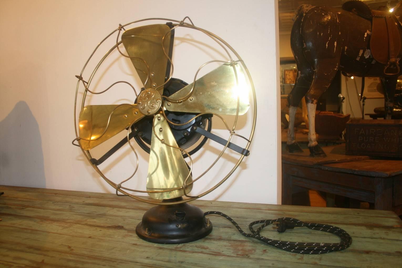 Beautiful Early G.E. Electric Fan.  All brass blades and cage. The motor has been completely refurbished, Perfect for the anti air conditioning person and who likes the early electric/industrial look.  