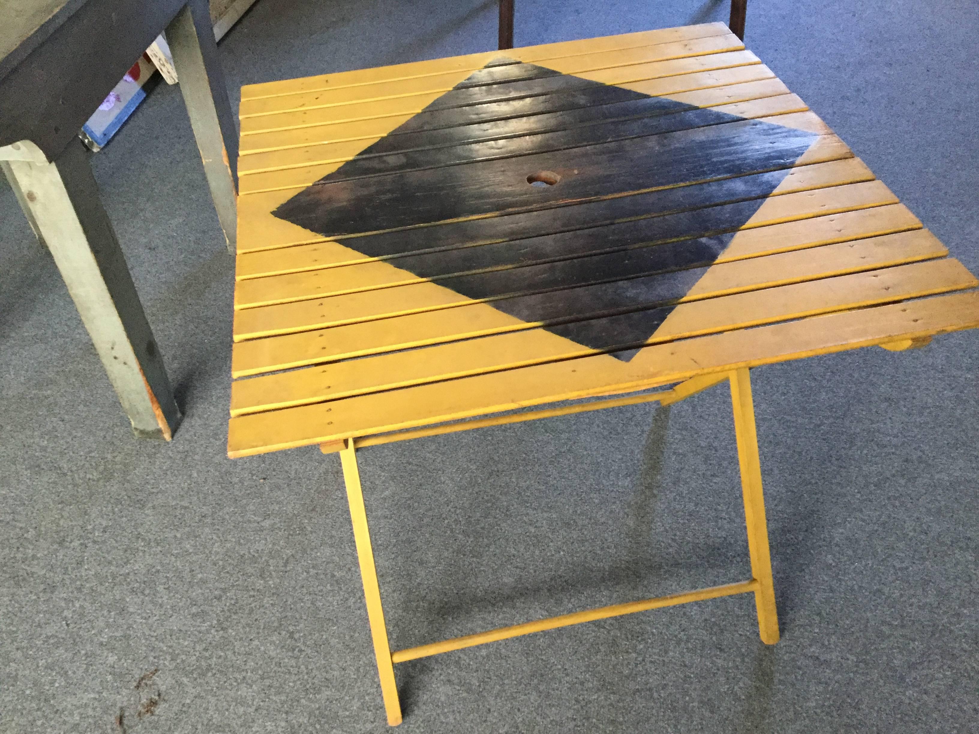 Yellow and black slat folding card or side table. Great looking table. A great way to add an usual color.