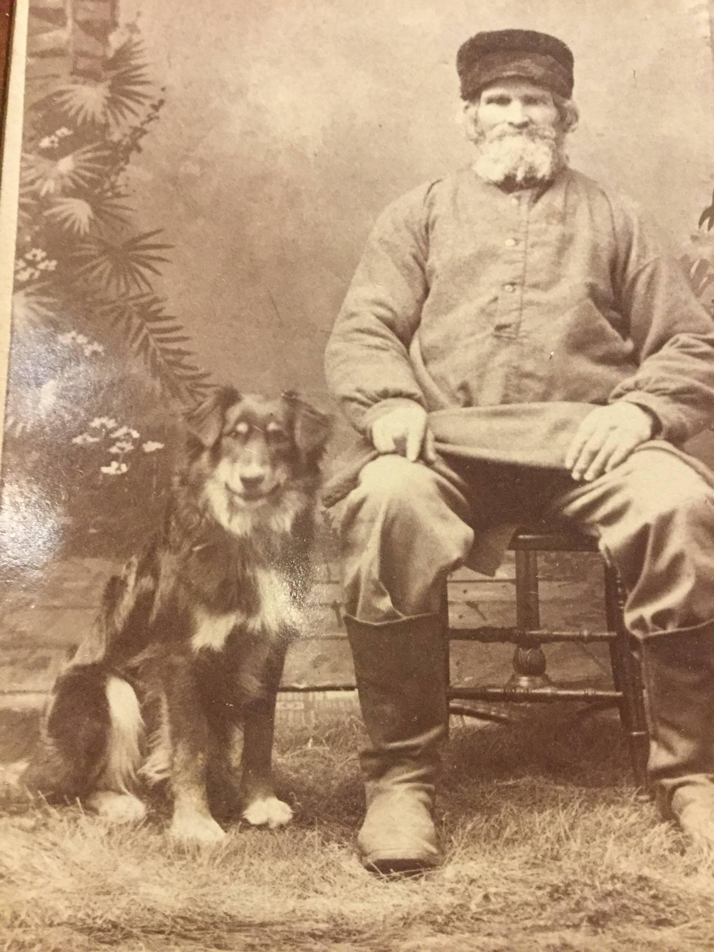 Early Carte de Viste Man and his dog. The man resembles a Russian peasant around 1880 but the photograph was taken in Fitchburg, Ma. Great image!