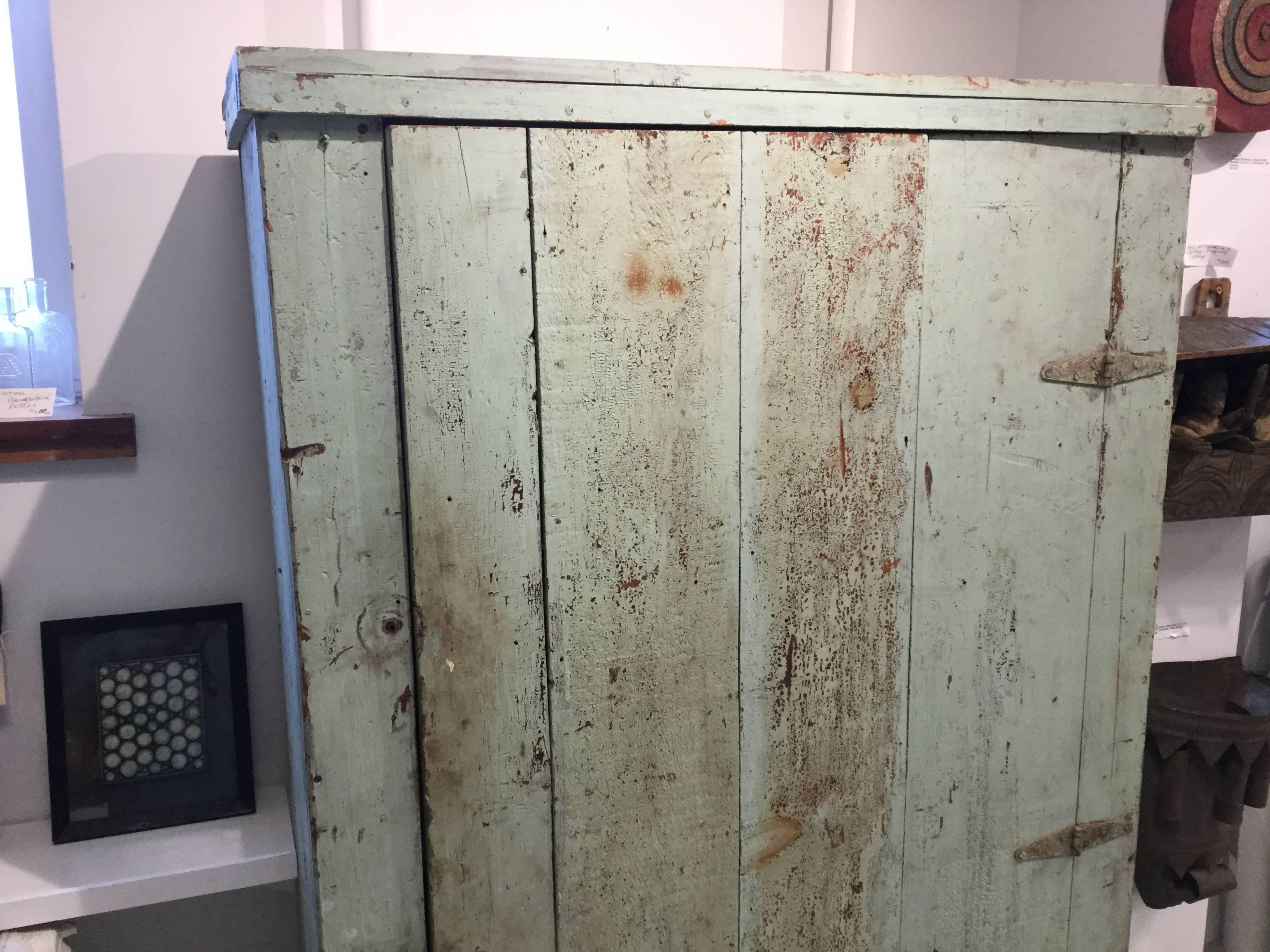 Americana Robins egg blue painted cabinet. It's hard to describe when a utilitarian cabinet like this has the perfect scale proportions and color. The patina is just beautiful and all Paint is original 120-130 years young. There is a drawer on