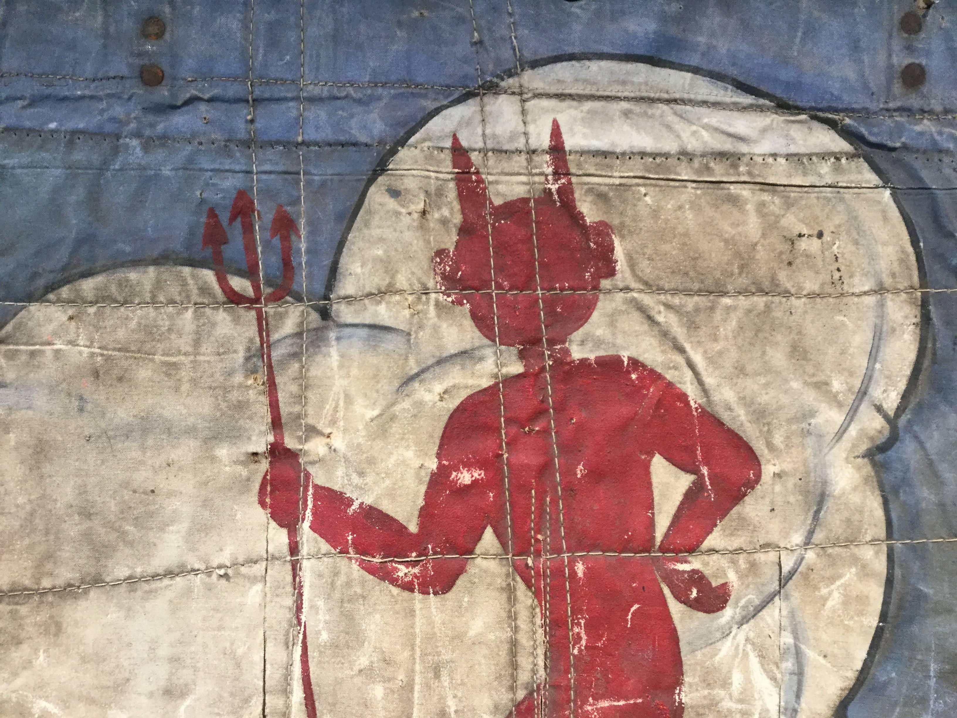 Red Carnival devil painted on original circus tarp. Original paint. Great image.