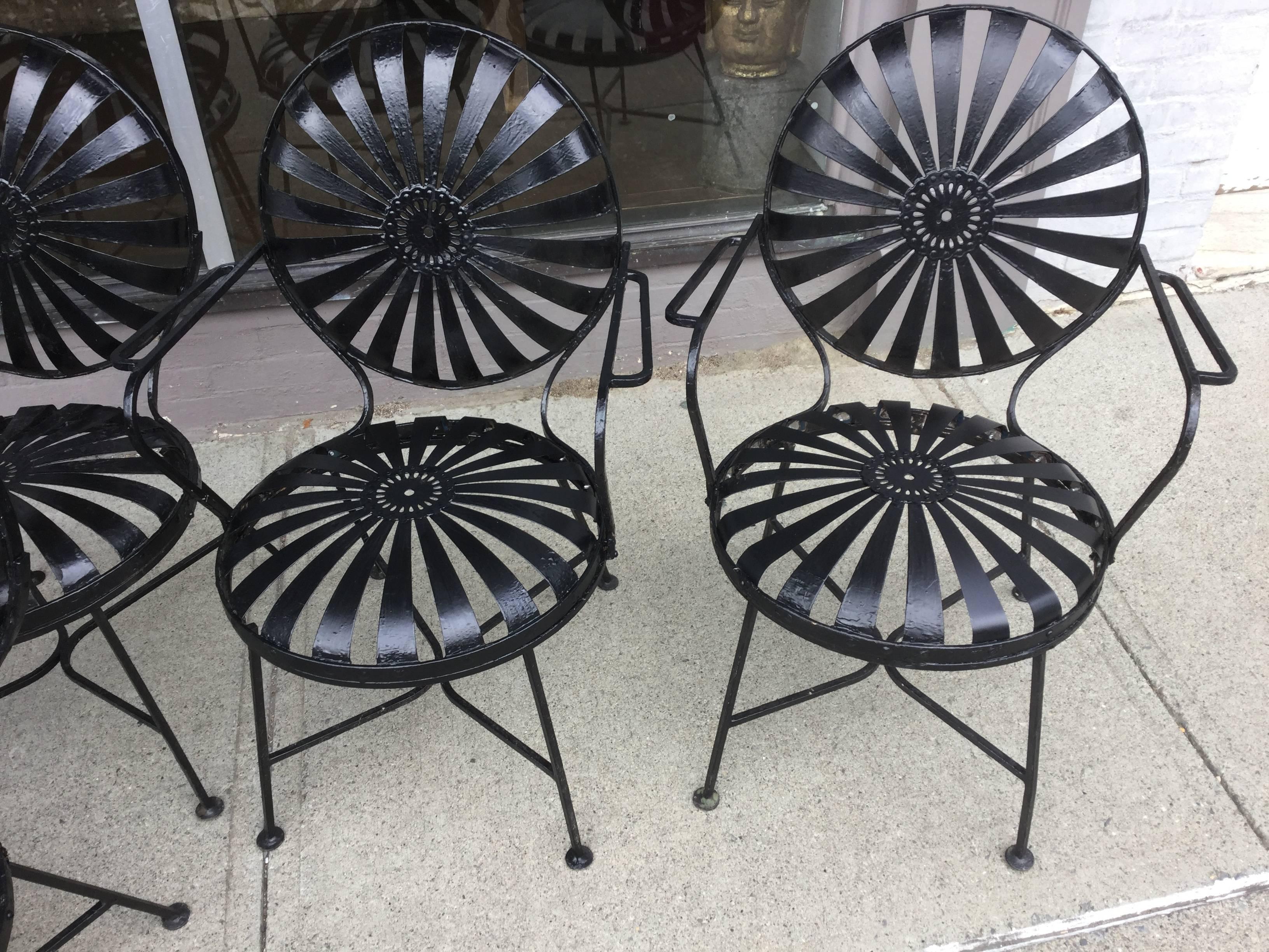 Set of six Francois Jarre chairs. Some people call these springer chairs or sunburst chairs. Originally designed circa 1920 in France, this were made in the 1950s. The legs and armrests have a more modern design than the earlier chairs. There are