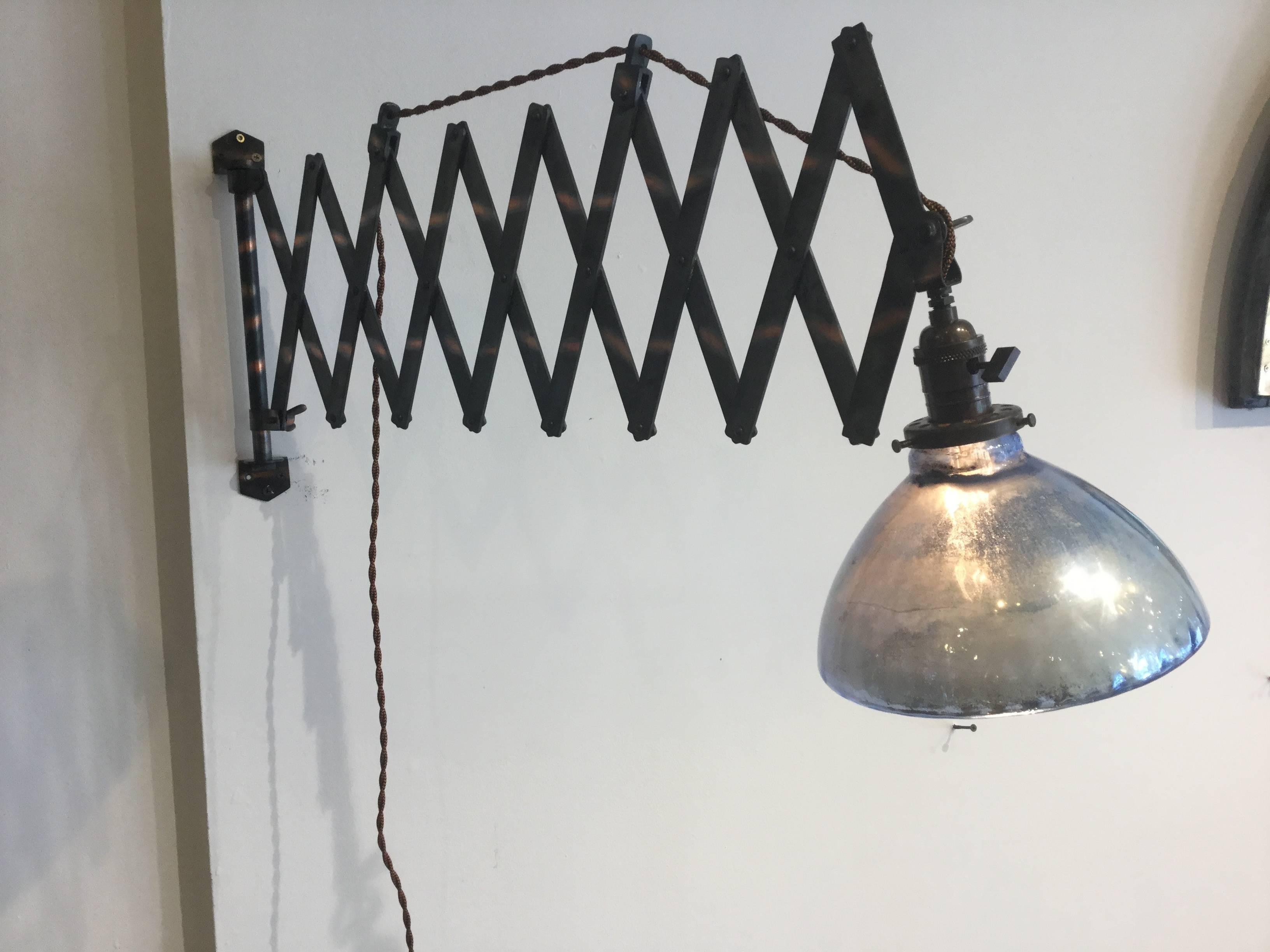 Blue mercury glass shade with japanned scissor Industrial fixture. The blue Mercury looks great with the Copper fixture. Both pieces were made circa 1900. New wiring. Ready to mount on the wall.