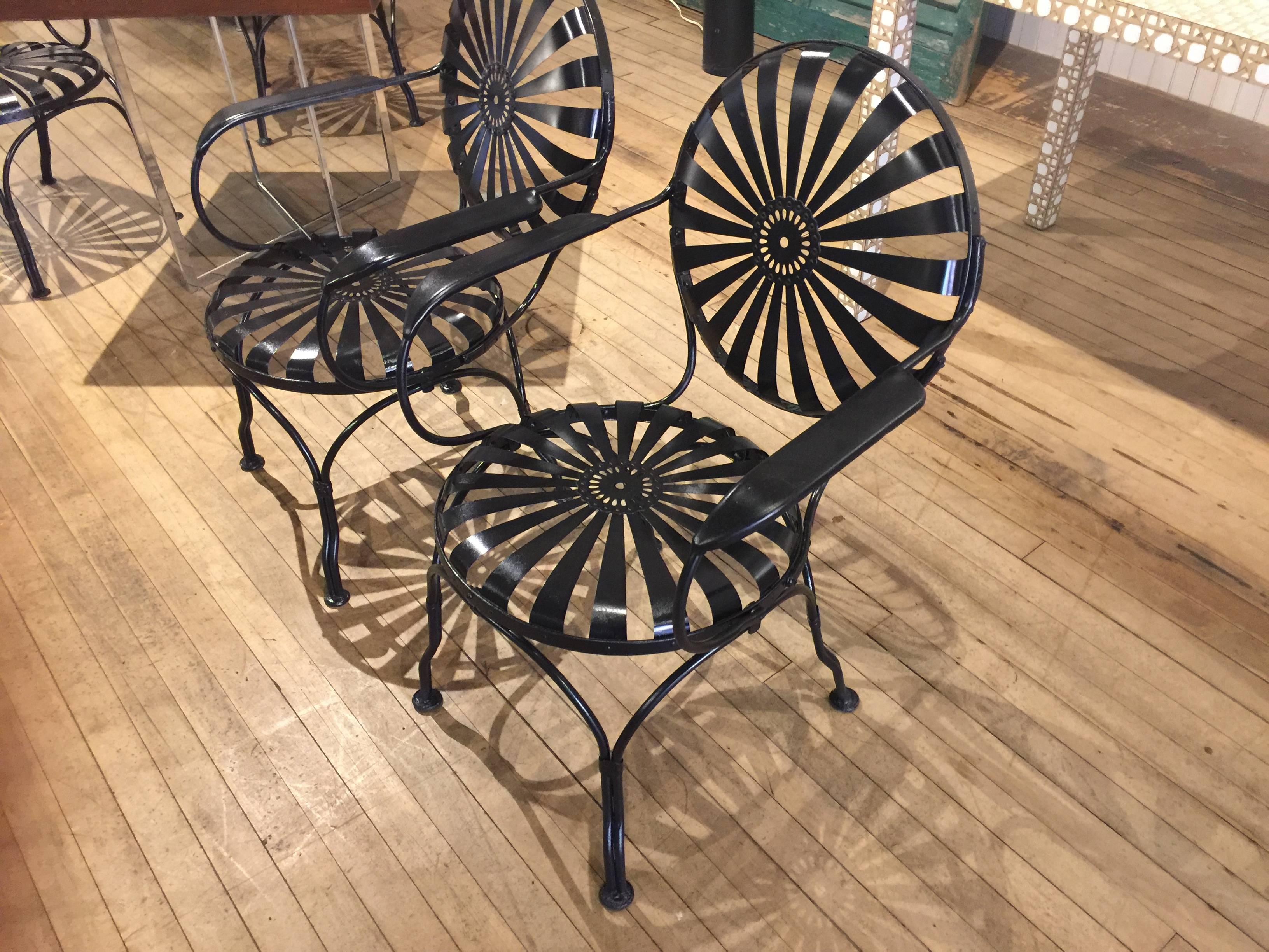 Very large set Francois Carre chairs. Six armchairs, settee, and single side chair. All chairs are in great shape and seats have been restored.
