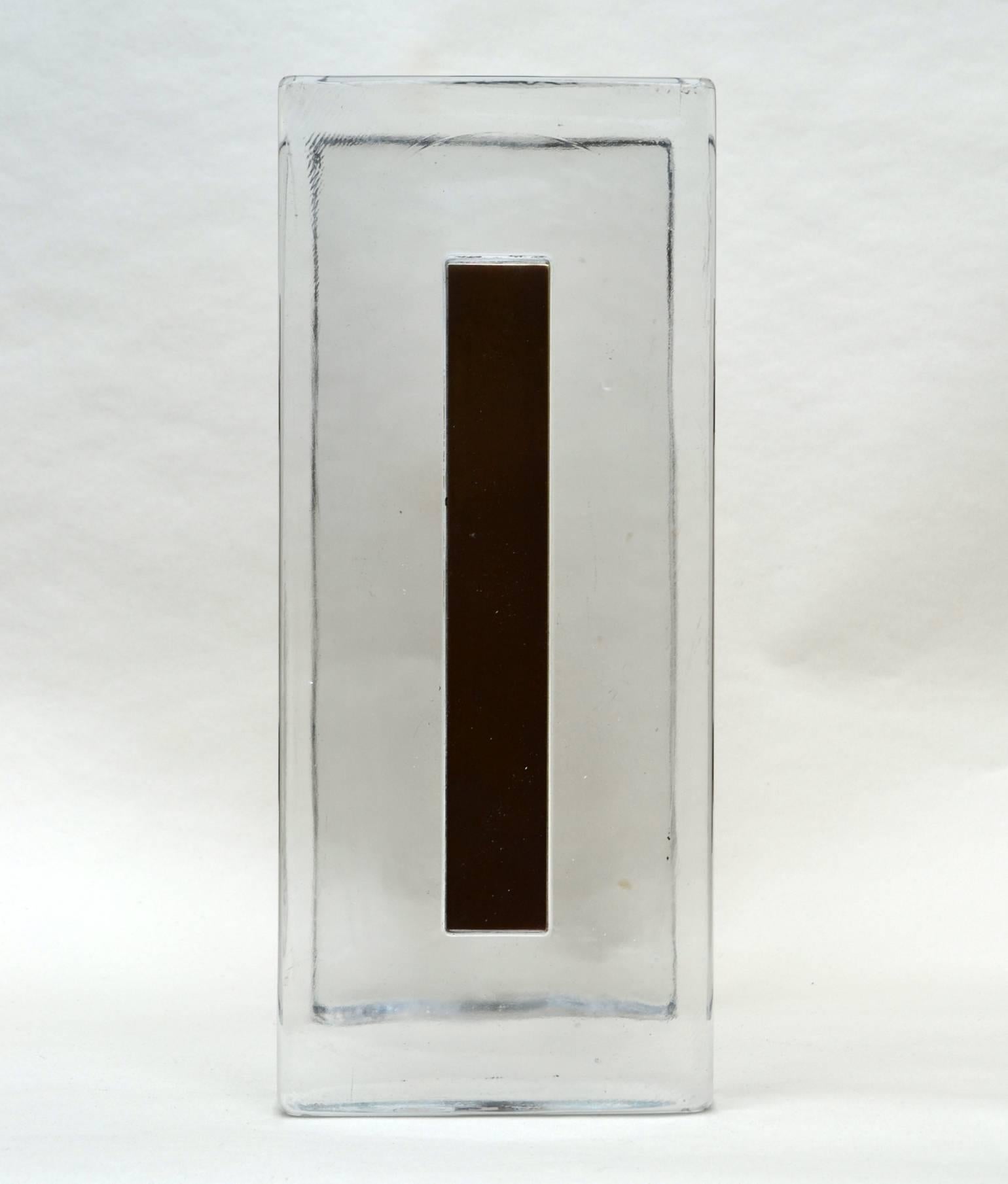 Clear glass cast push and pull door handle with brass plate and fittings, designed for a glass door. They are made in solid glass, 3cm thick. The brass plates are oxidized through age but can also be repolished on request.

A selection single door