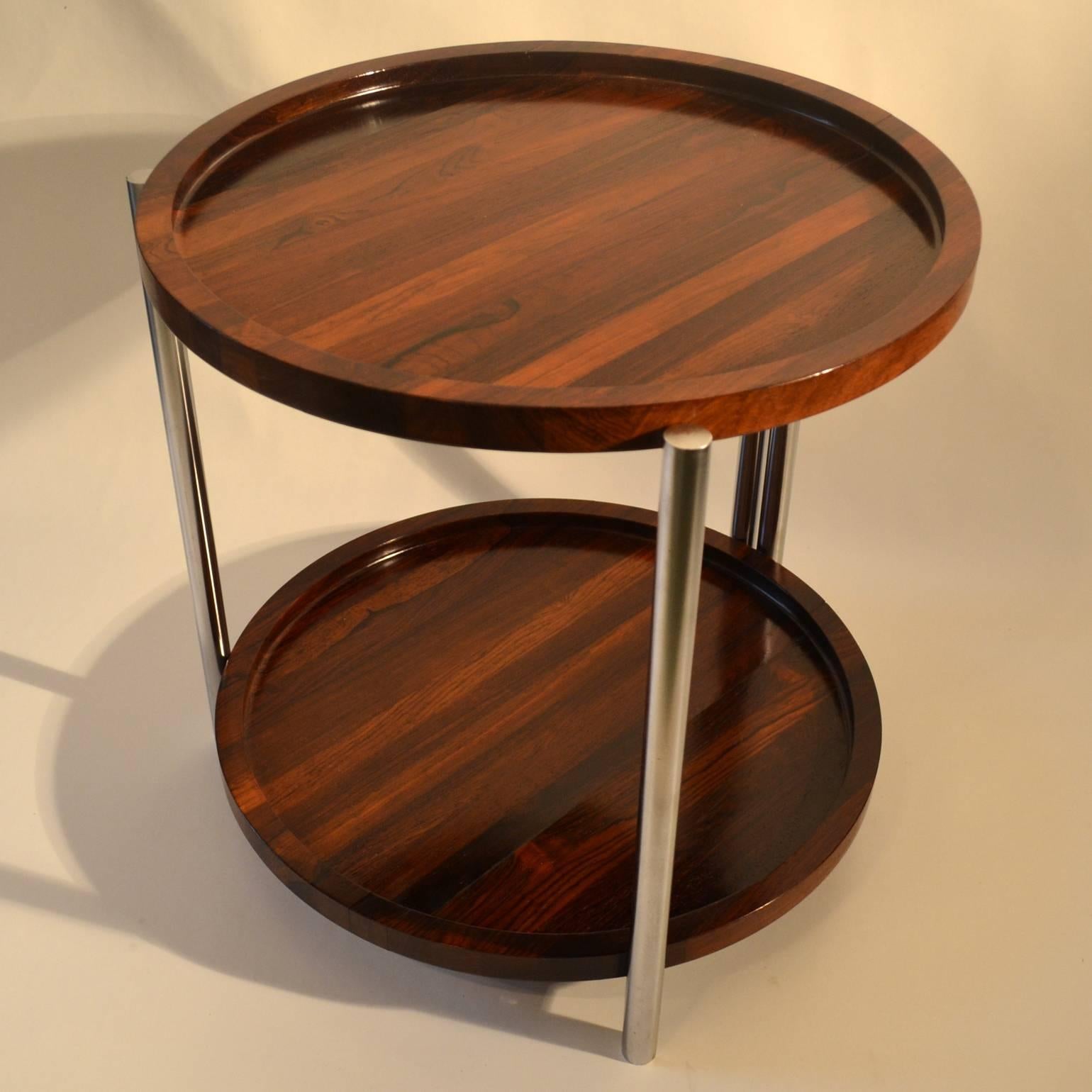 Two level cocktail or side table with two hand carved round wooden trays in Brazilian Ironwood  on a foldable stainless steel frame. Ideal as a serving table for cocktail parties and easy to move around the room. This occasional table can be flat