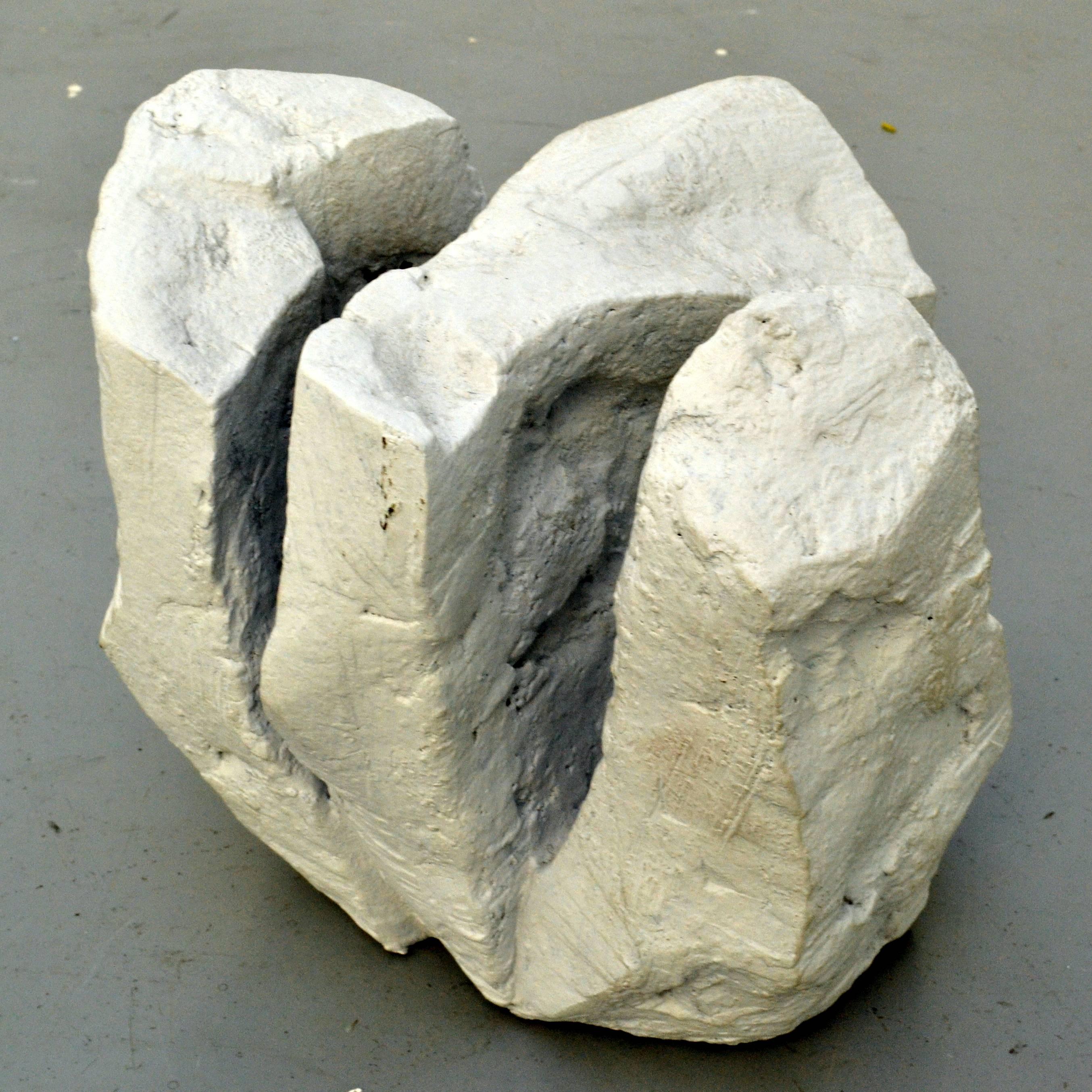 This hand formed ceramic sculpture looks like white cliffs on the British coast line. His work echoes a voyage of discovery in not just the visible natural world of trees, rocks but the city and Industrial landscape with his exploration of space and