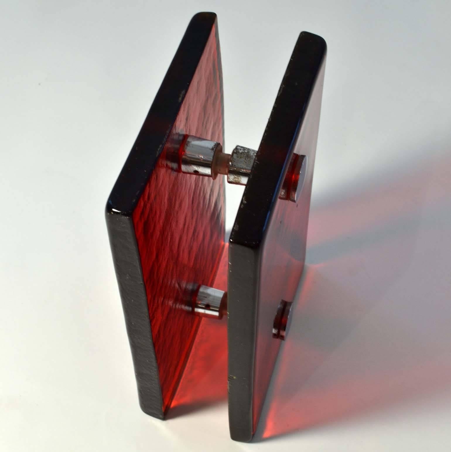 Red cast glass push and pull door handle with chrome fittings designed for a glass door. 
A selection of this model door handles available in amber, red, orange and grey glass.