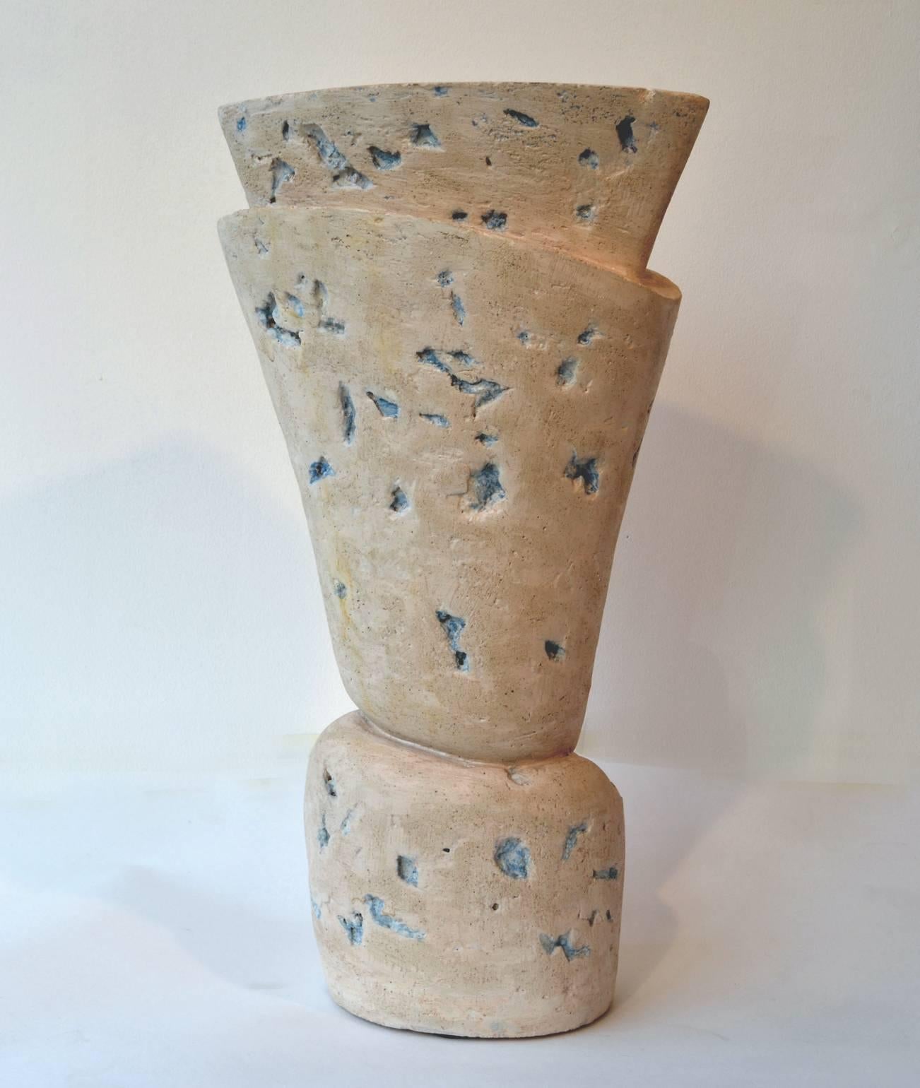 Tall decorative hand formed ceramic vessel by Willem Schalling coloured in cream and light blue. He made a number of unique vases, vessels and urns from the late 1950s till the 1980s.
He lived and worked in Amsterdam and was an assistant to the