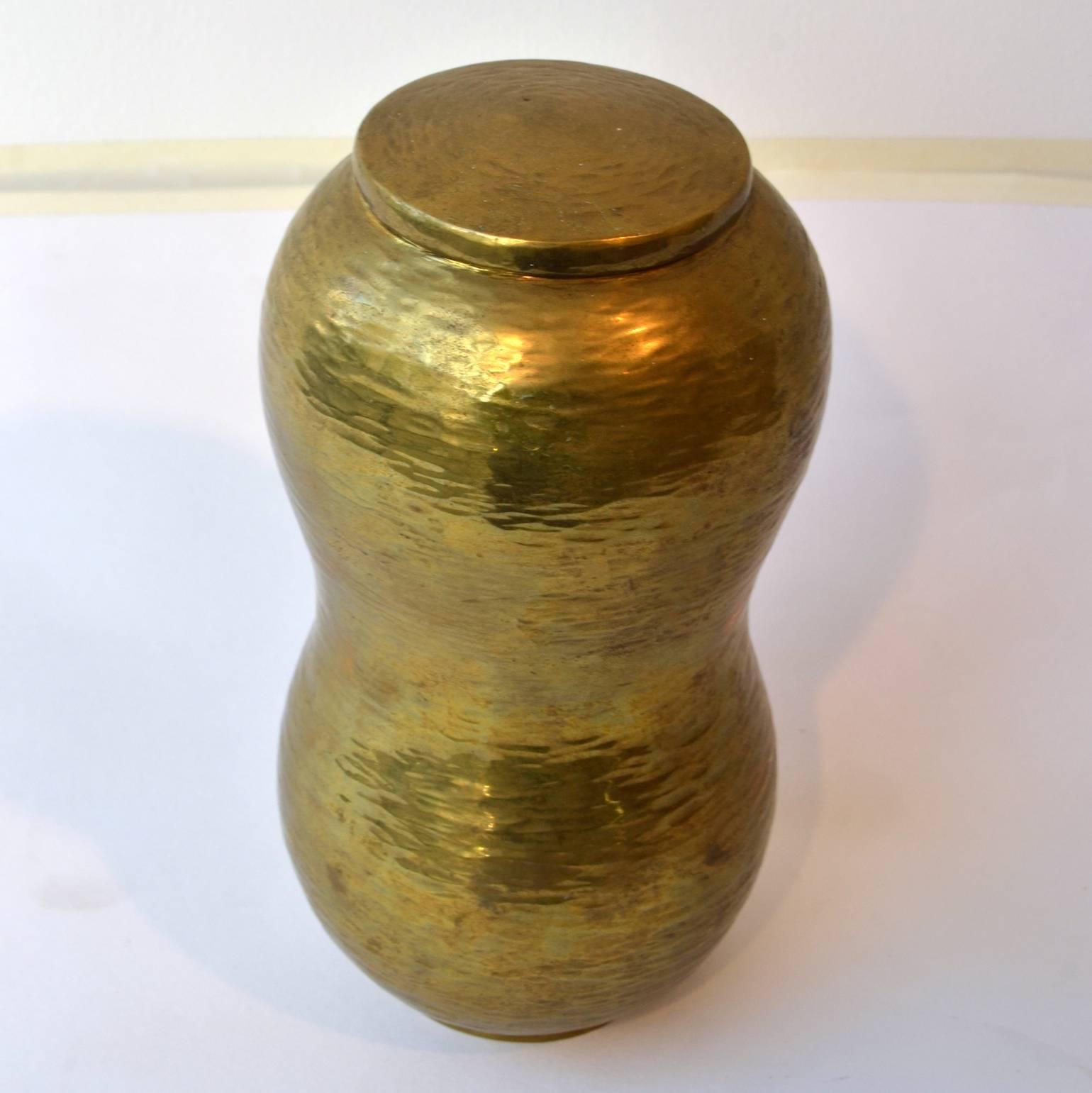 Tactile hand driven brass vessel or container with lid signed Franz J. Peters Stolberg RH, Peters, 1913-1977. In this handcrafted container the traces of his hand driven tools are visible and decorative. Peters was a blacksmith and sculptor was a